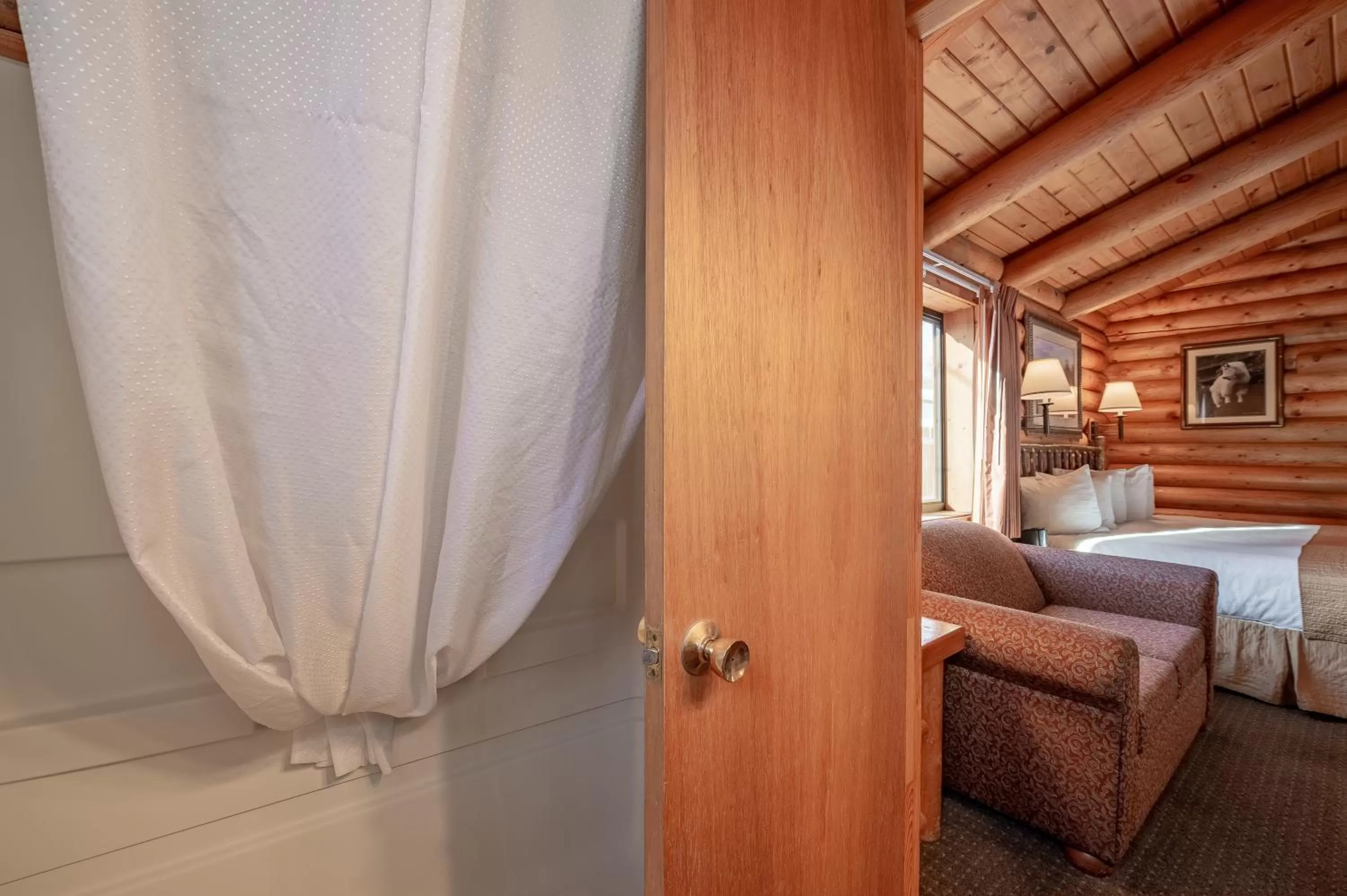 Shower, Bed in Cowboy Village Resort