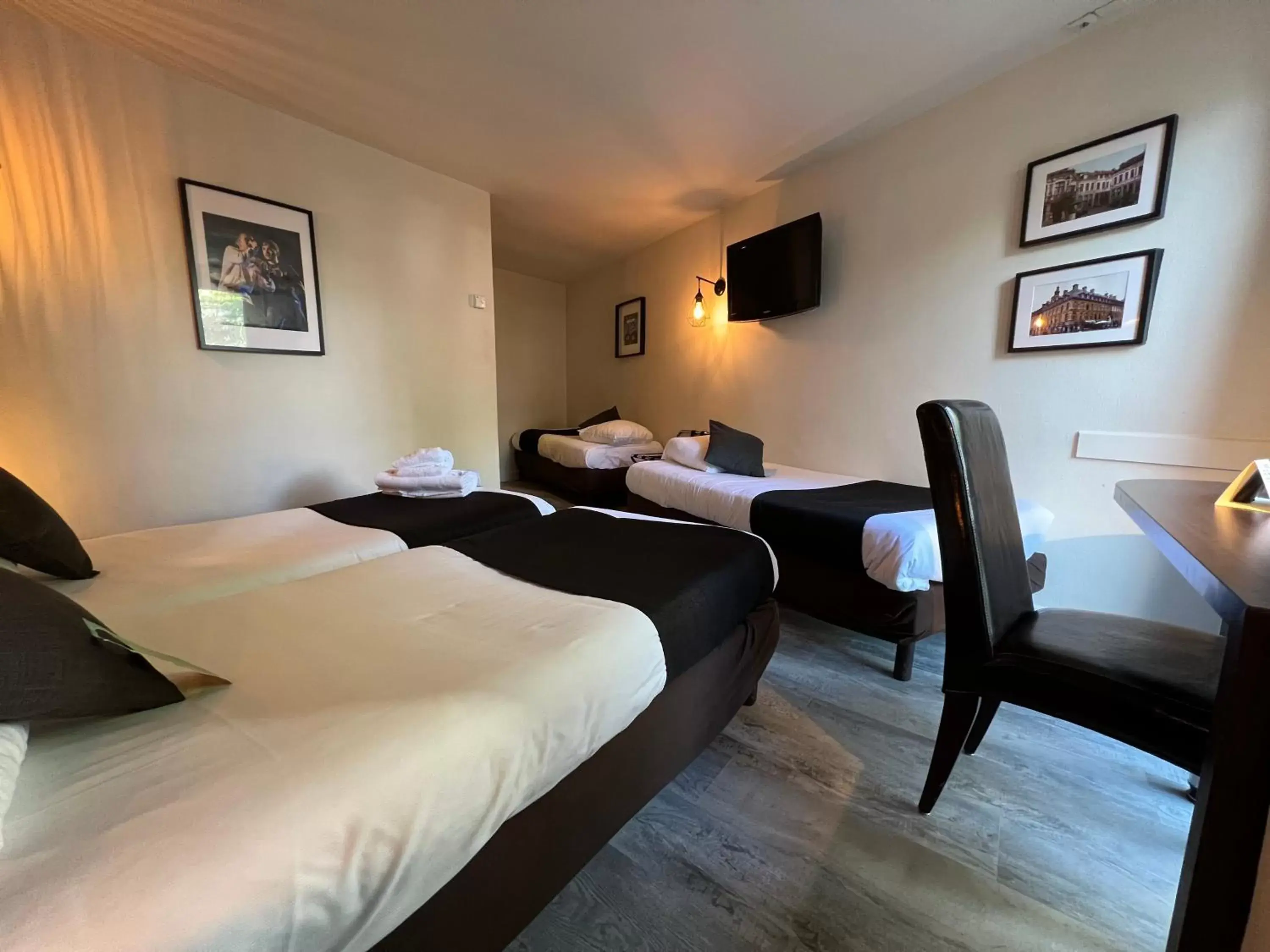 Photo of the whole room, Bed in Logis Hôtel Restaurant Des Acacias Lille Tourcoing