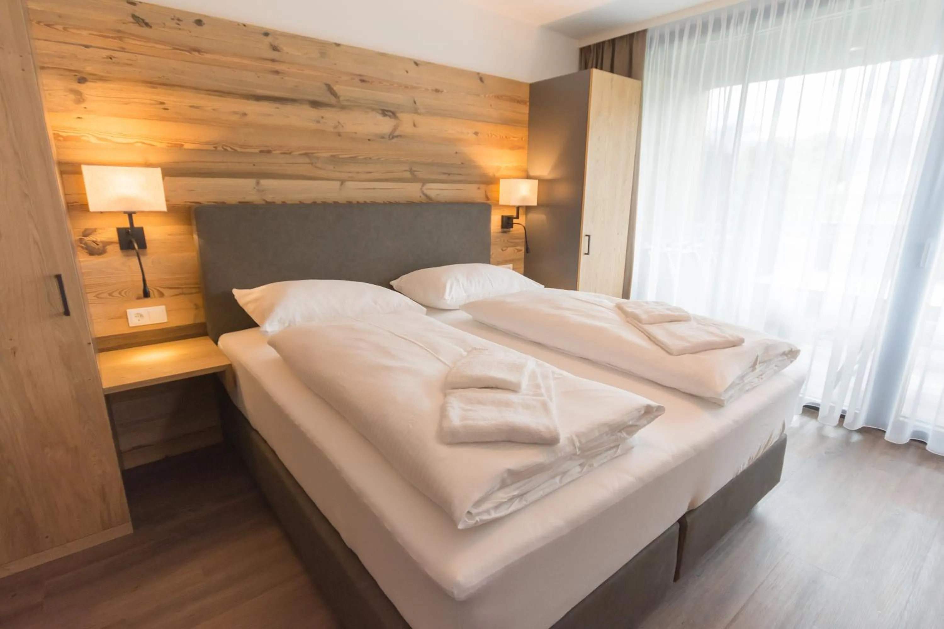 Bedroom, Bed in Schönblick Residence - Absolut Alpine Apartments