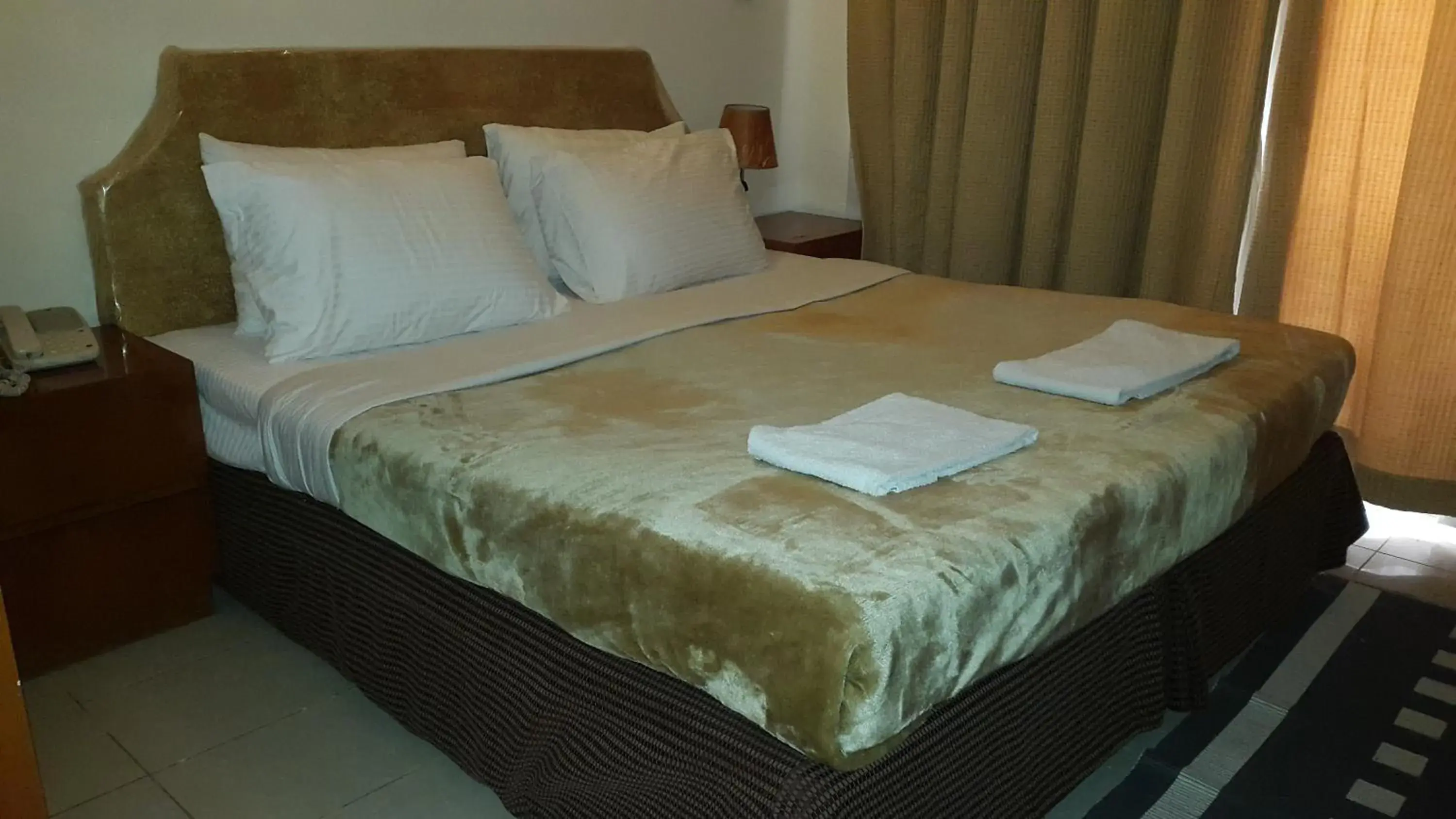 Bedroom, Bed in AL Raien Hotel Apartment