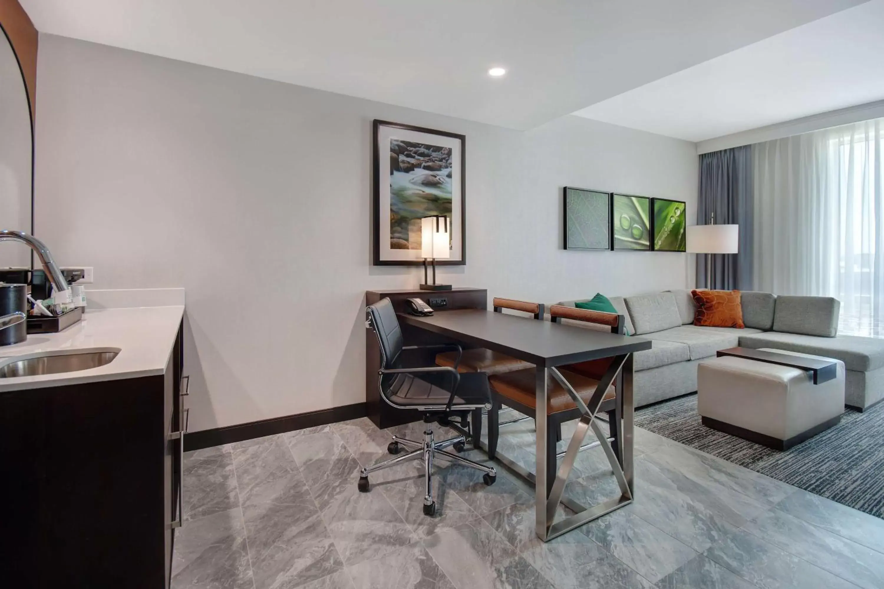 Living room in Embassy Suites By Hilton Alpharetta Halcyon Living room in Embassy Suites By Hilton Alpharetta Halcyon