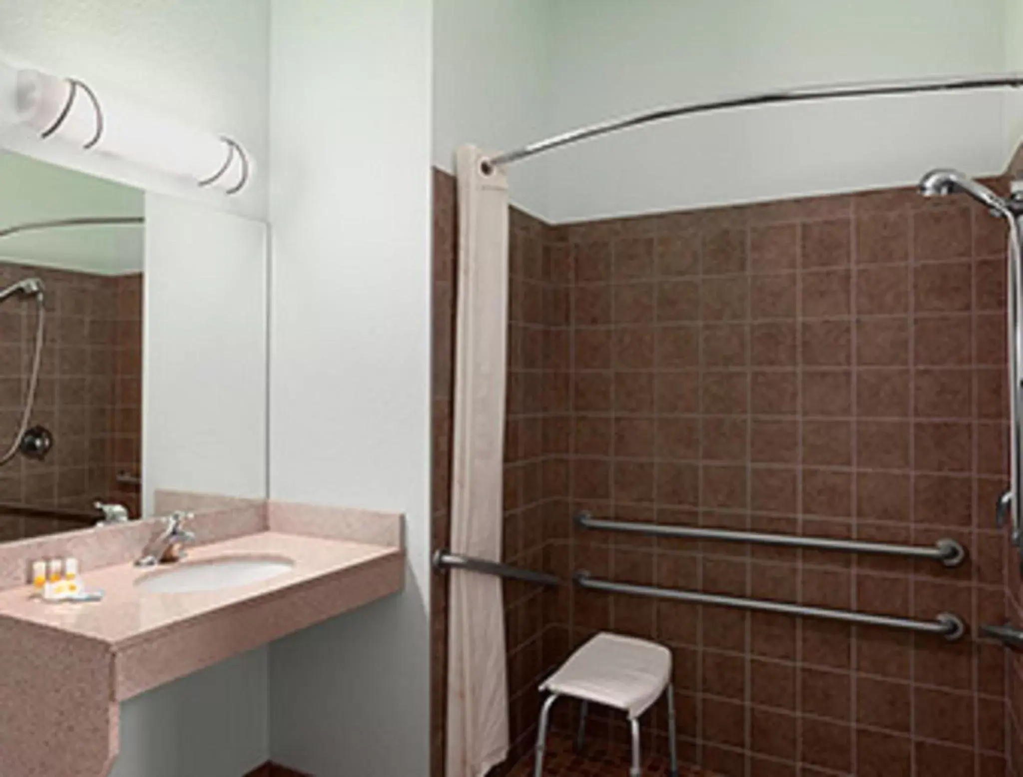 Bathroom in Days Inn & Suites by Wyndham Columbus NE