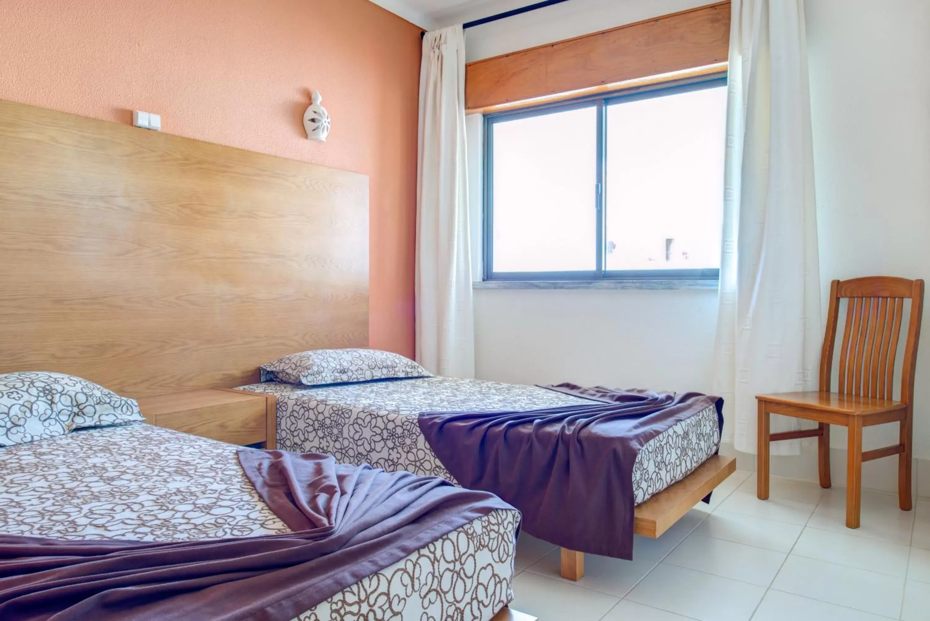 Bedroom in Choromar Apartments