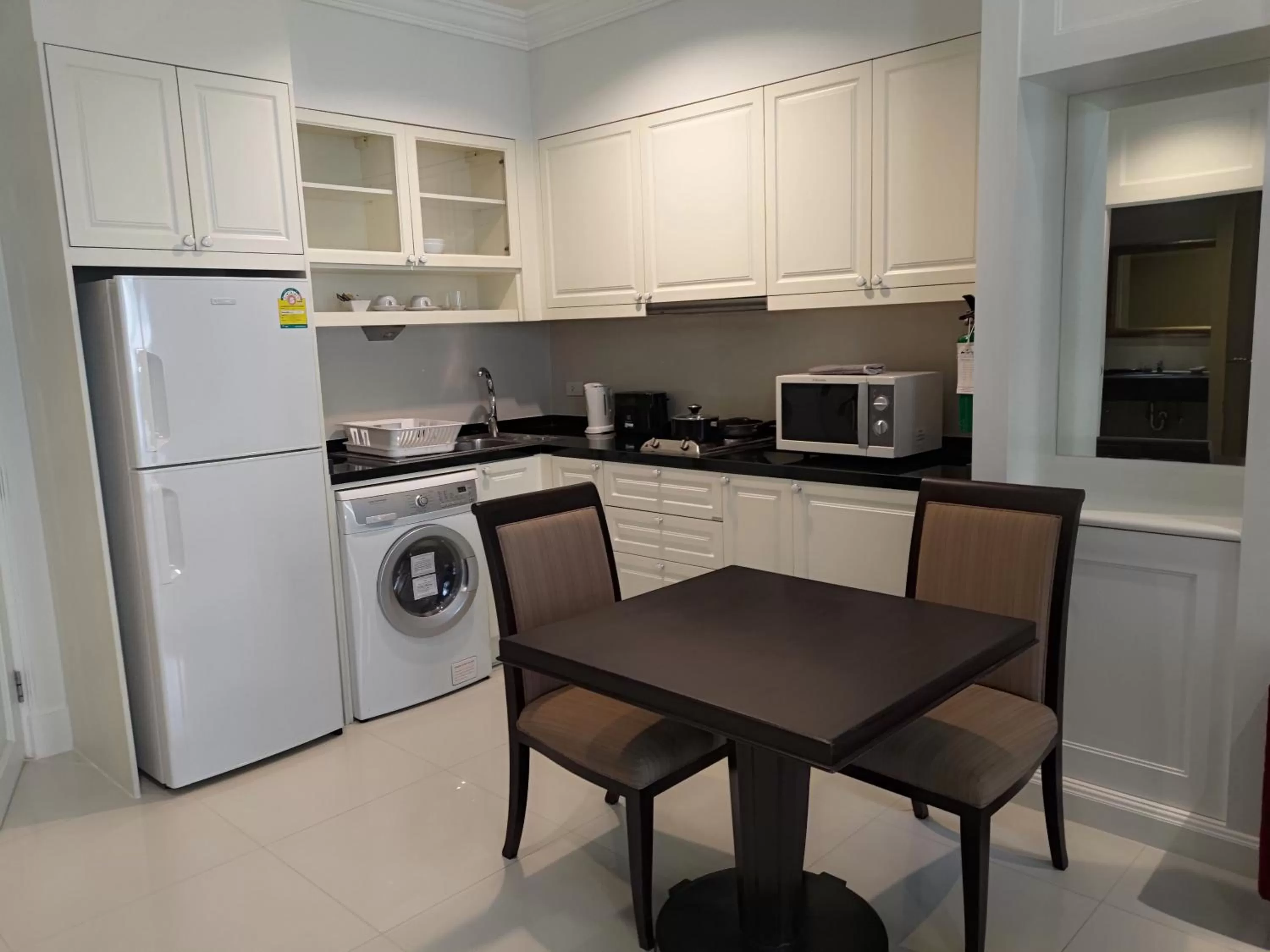 Kitchen or kitchenette in Hope Land Hotel 46/1