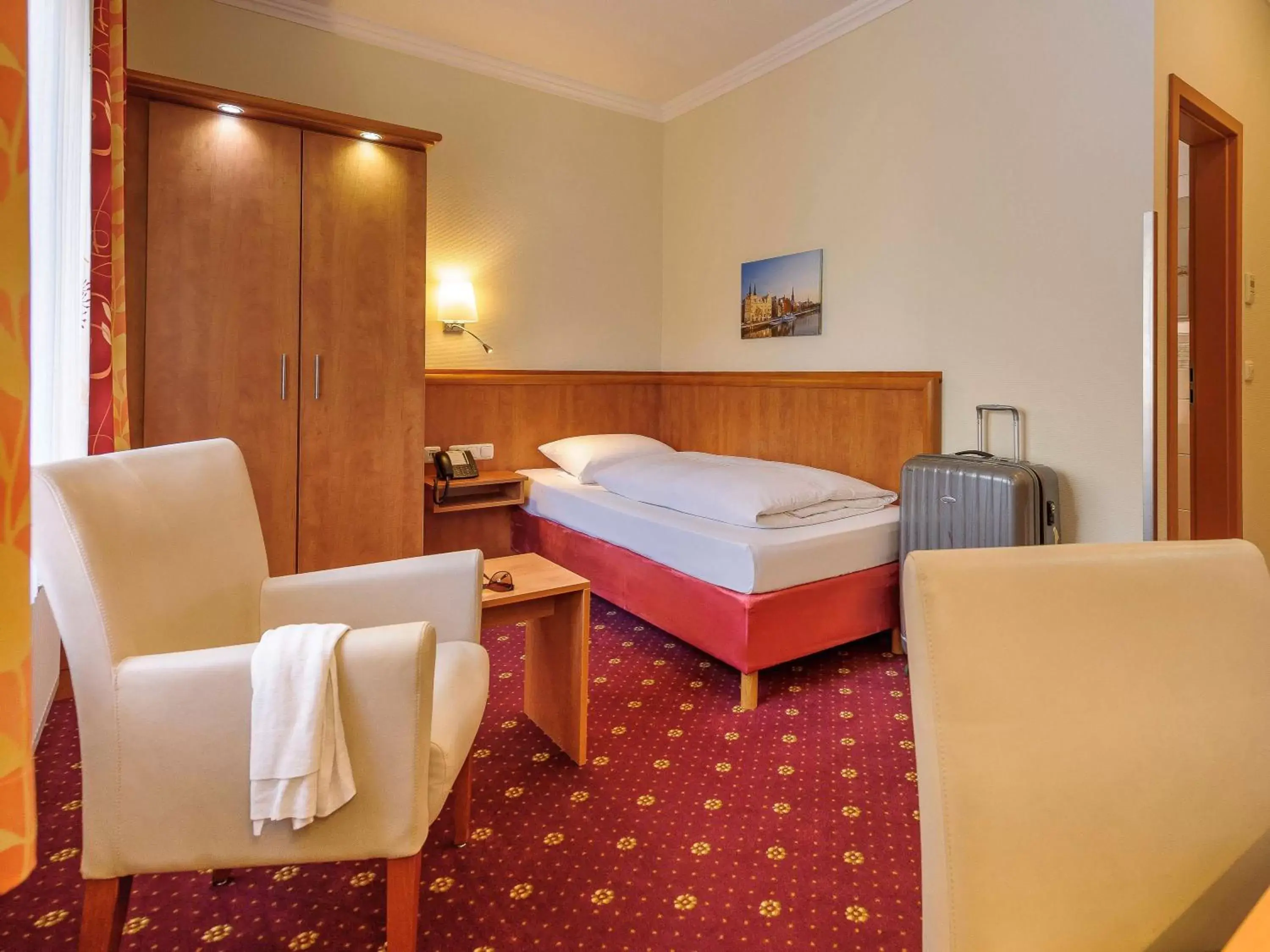 Photo of the whole room, Bed in Mercure Hotel Luebeck City Center