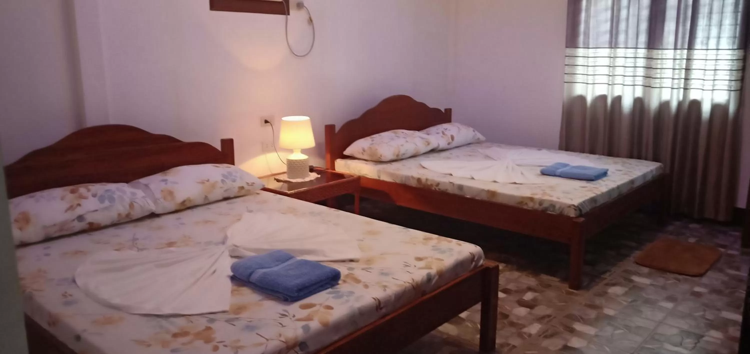 Bed in E&N Paradise Island Resort