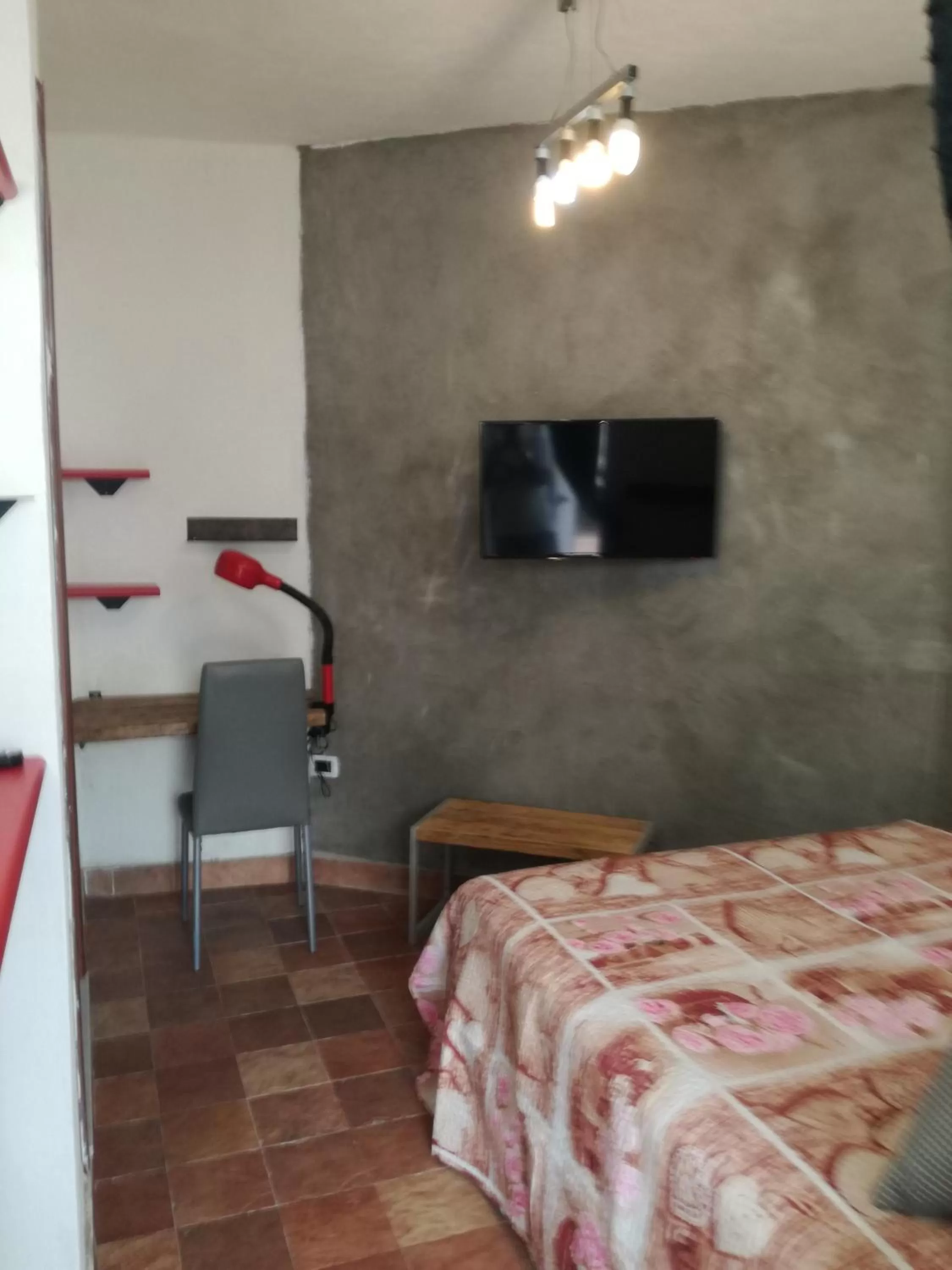 Bed in B&B PompeiLog