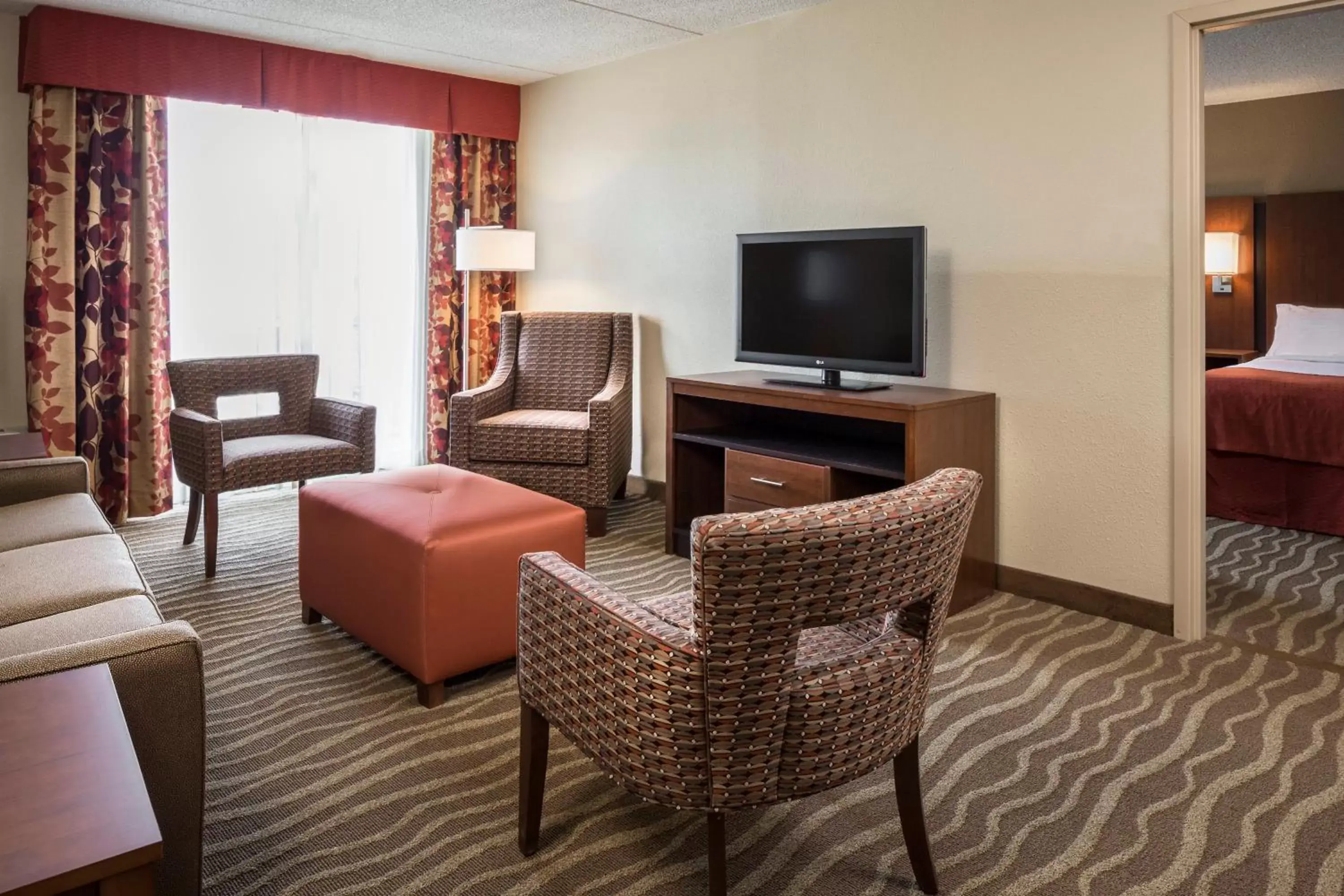 Photo of the whole room, TV/Entertainment Center in Holiday Inn Hotel & Suites Des Moines-Northwest, an IHG Hotel