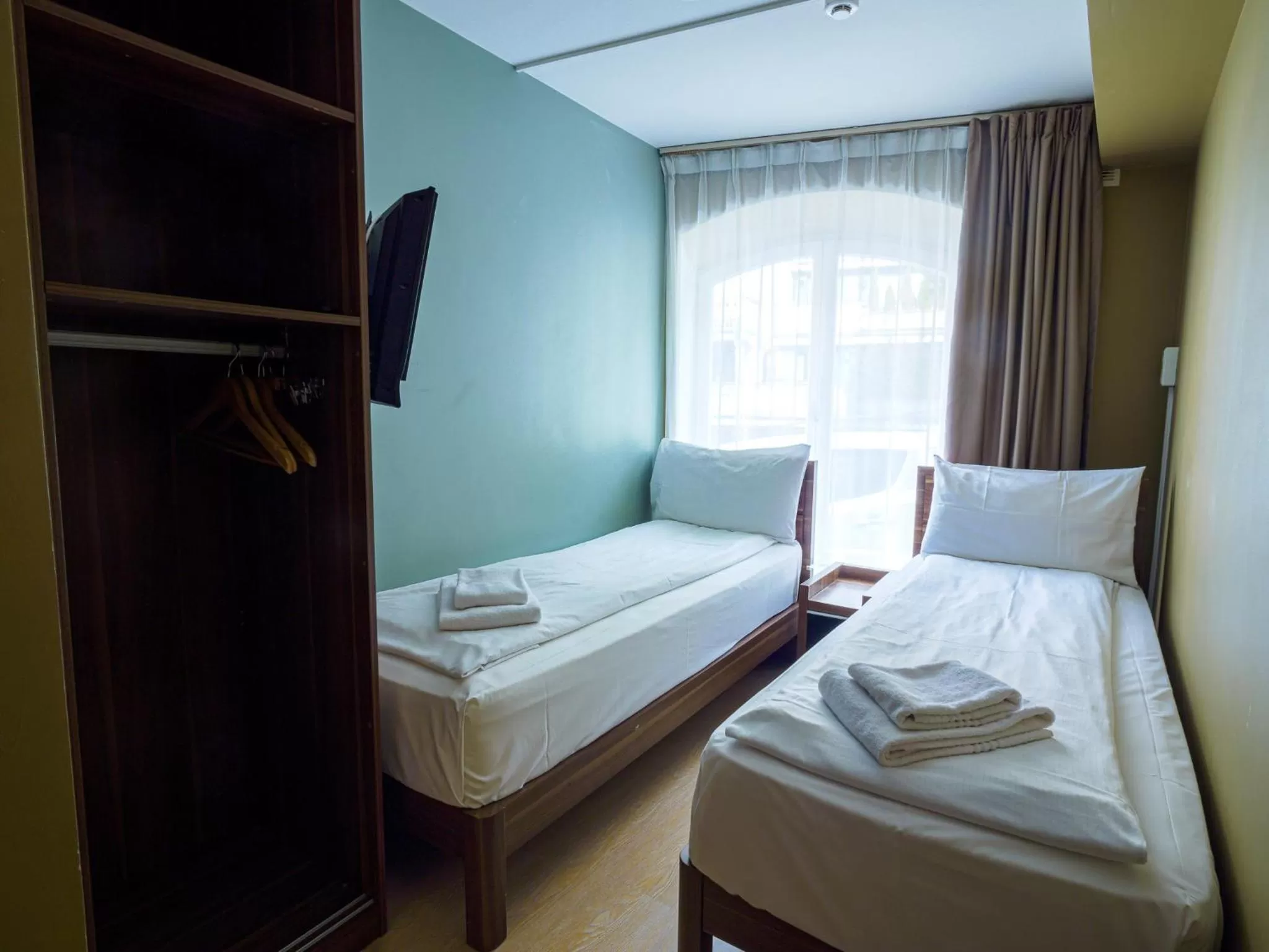 Bed in Central City Apartments