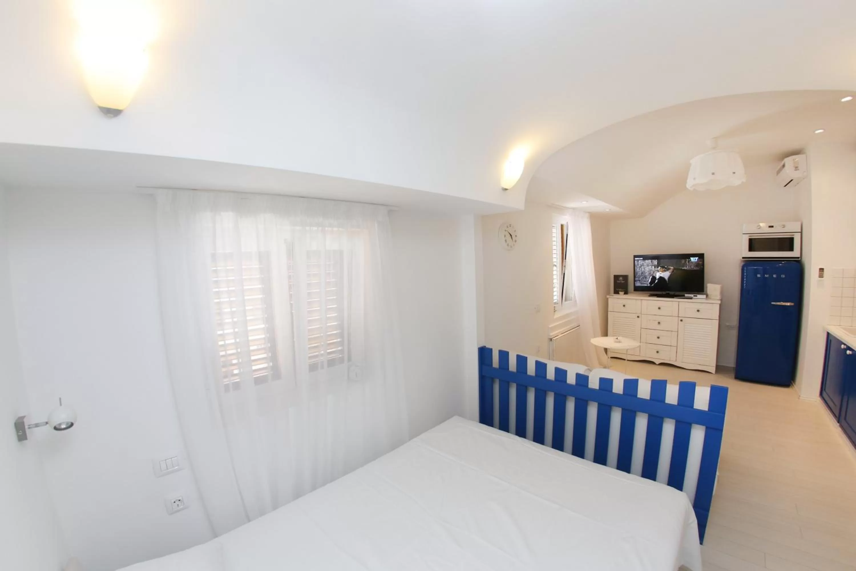 Bed in Central Apartments Integrated Hotel