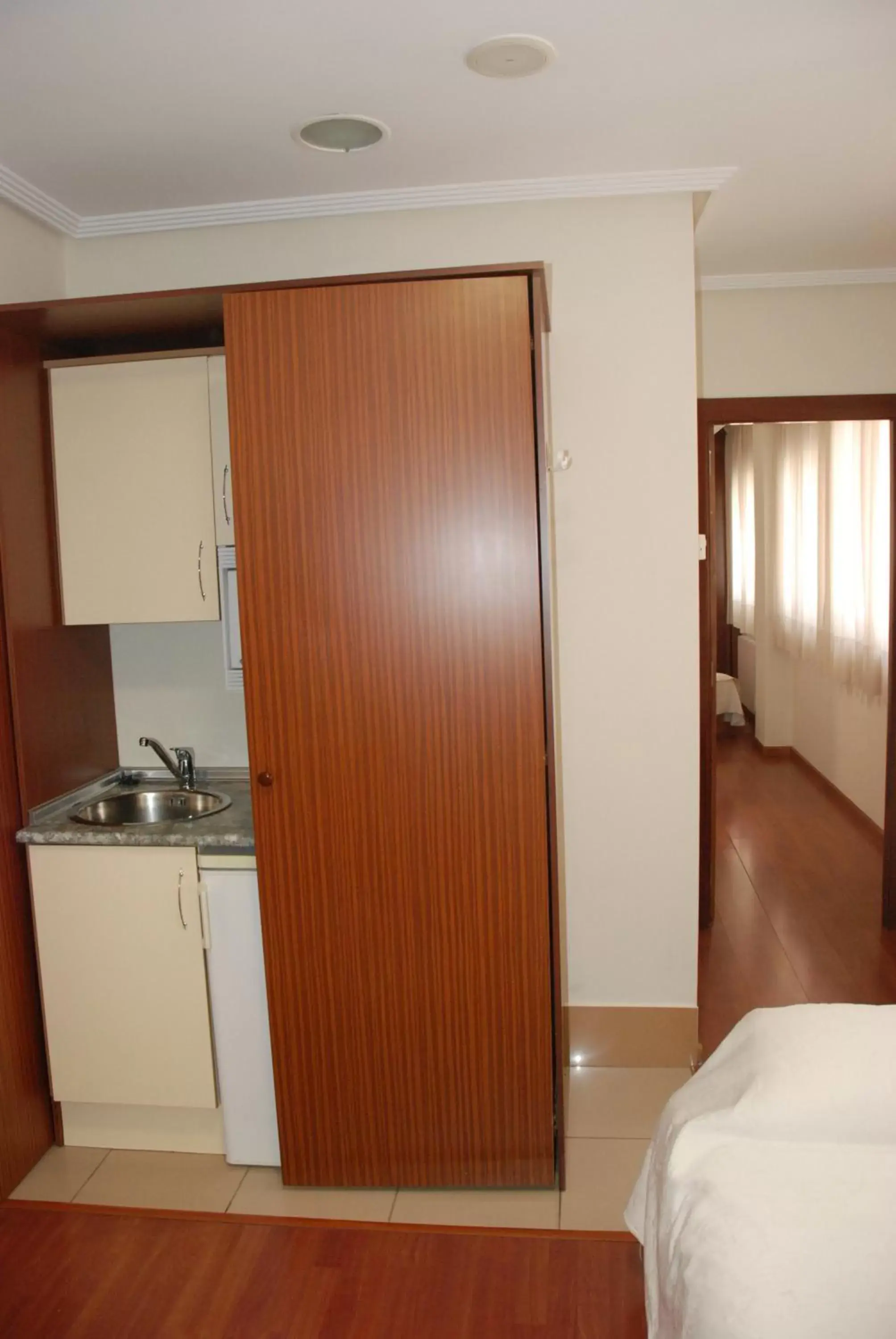 Kitchen/Kitchenette in Apartahotel FC Catedral