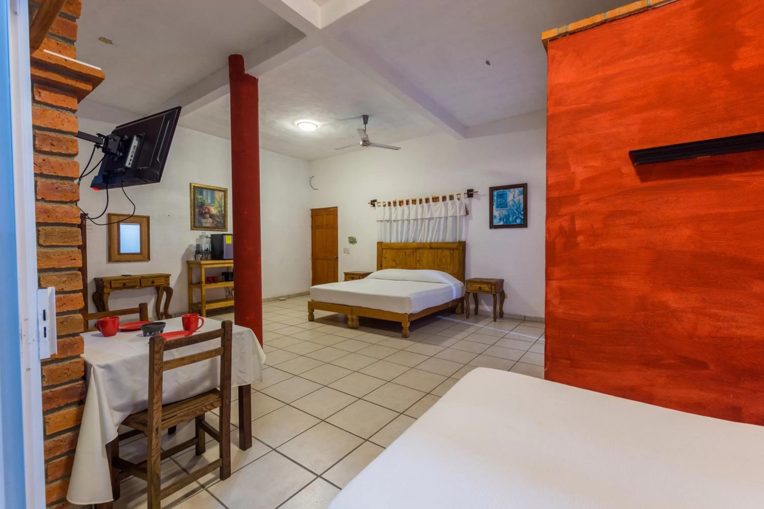 Bed in Traditional Sierra Leon Oceanfront Rooms - Adults Only