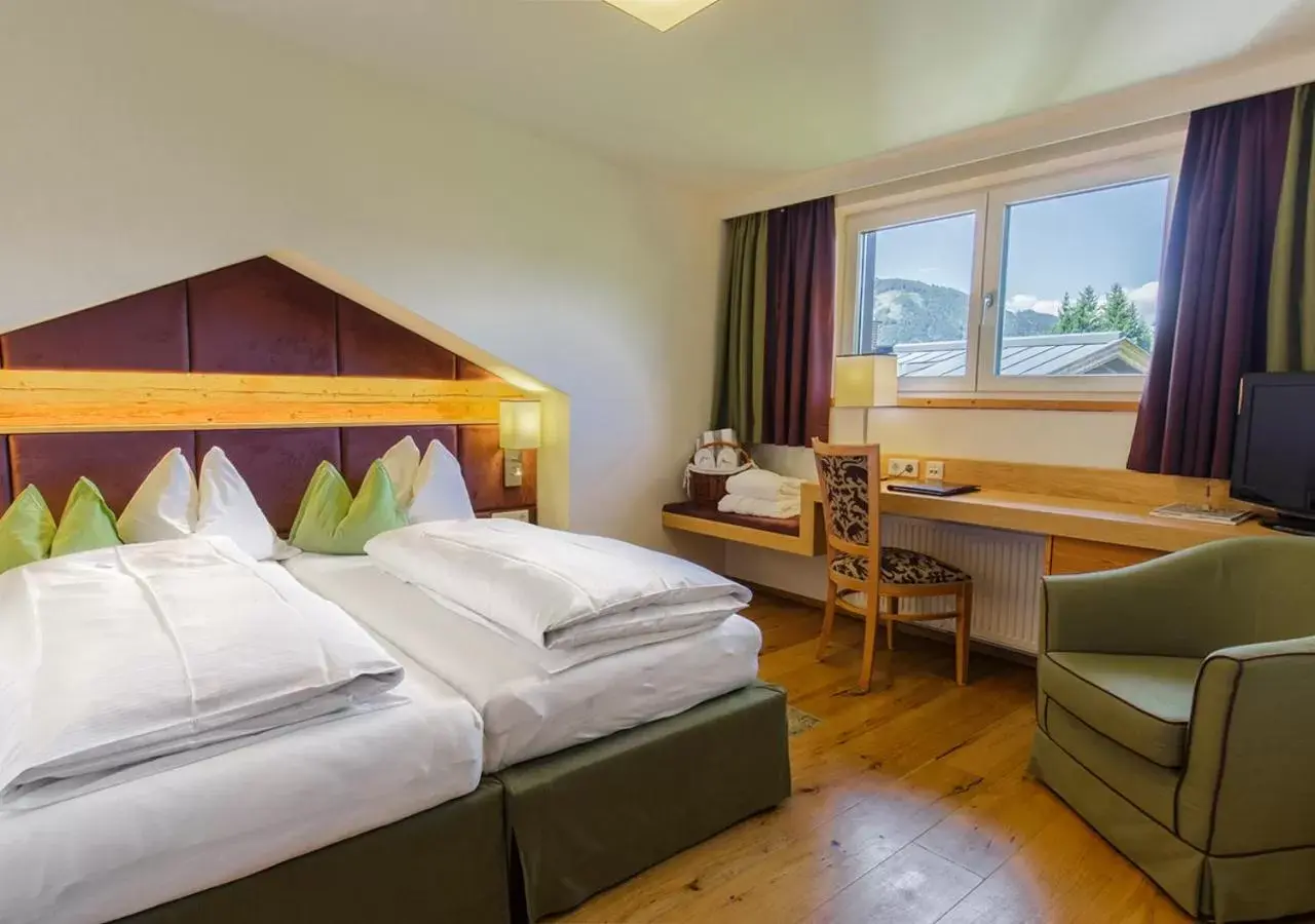 Photo of the whole room, Bed in Hotel Kaprunerhof Photo of the whole room, Bed in Hotel Kaprunerhof