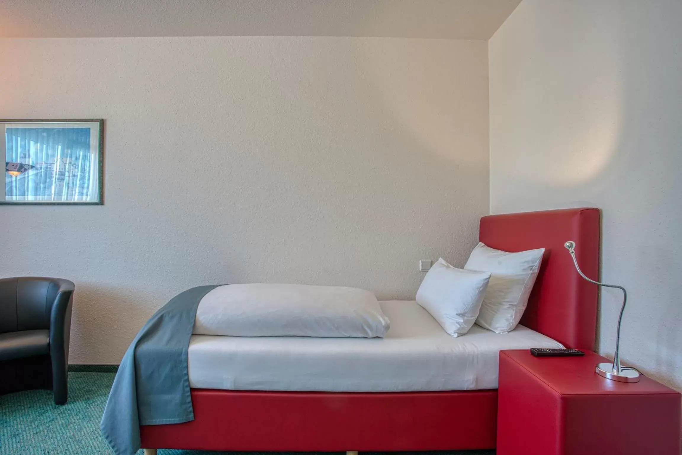 Photo of the whole room, Bed in Centro Hotel Böblingen