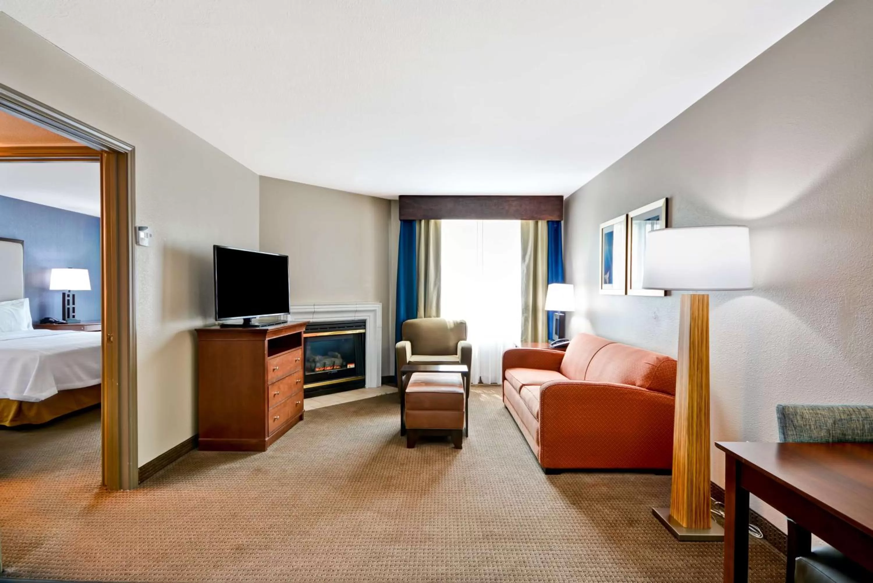 Living room, Bed in Homewood Suites by Hilton Dallas-Lewisville