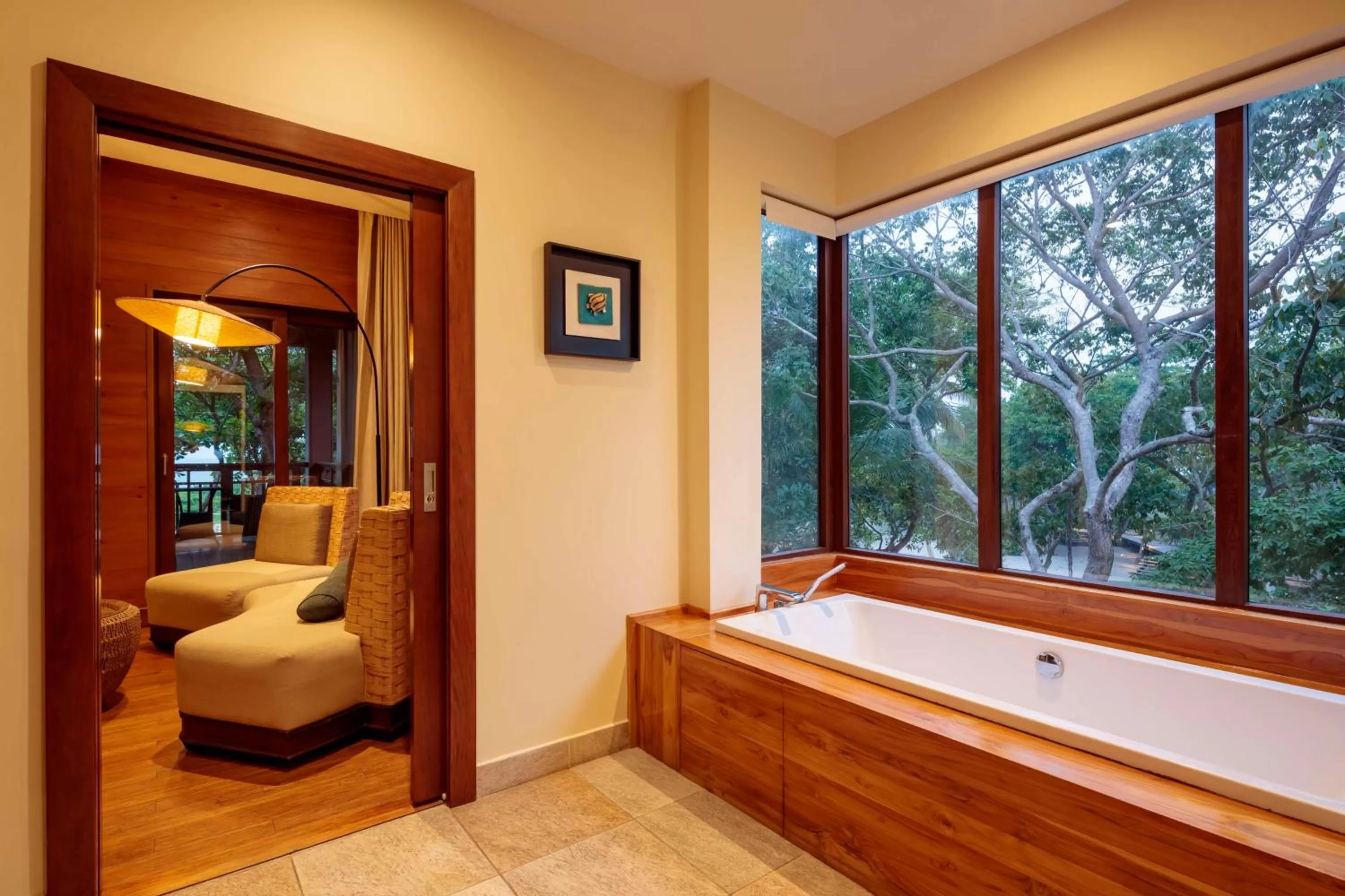 Bathroom in Indura Beach & Golf Resort Curio Collection By Hilton