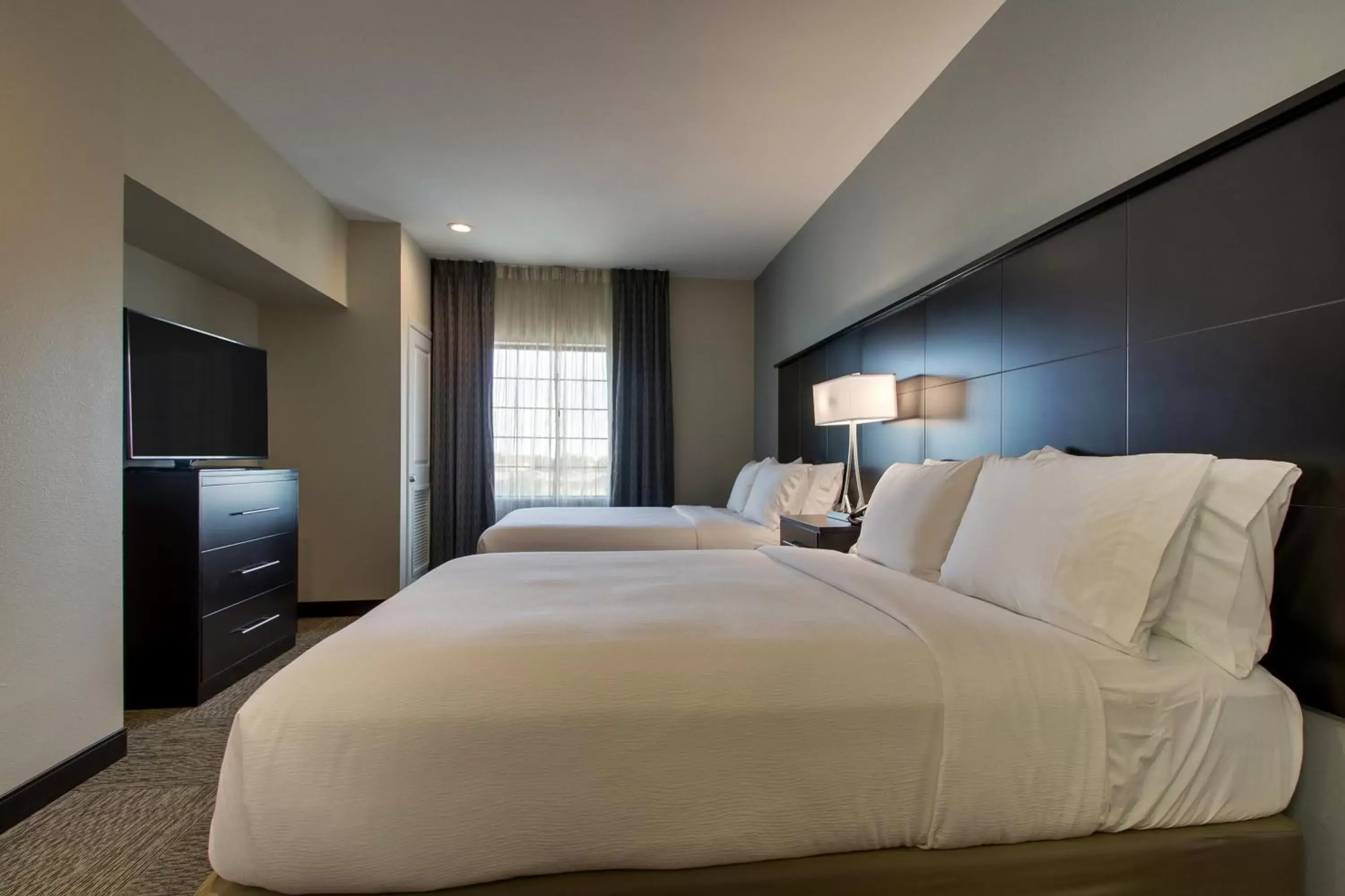 Photo of the whole room, Bed in Staybridge Suites Plano - The Colony, an IHG Hotel