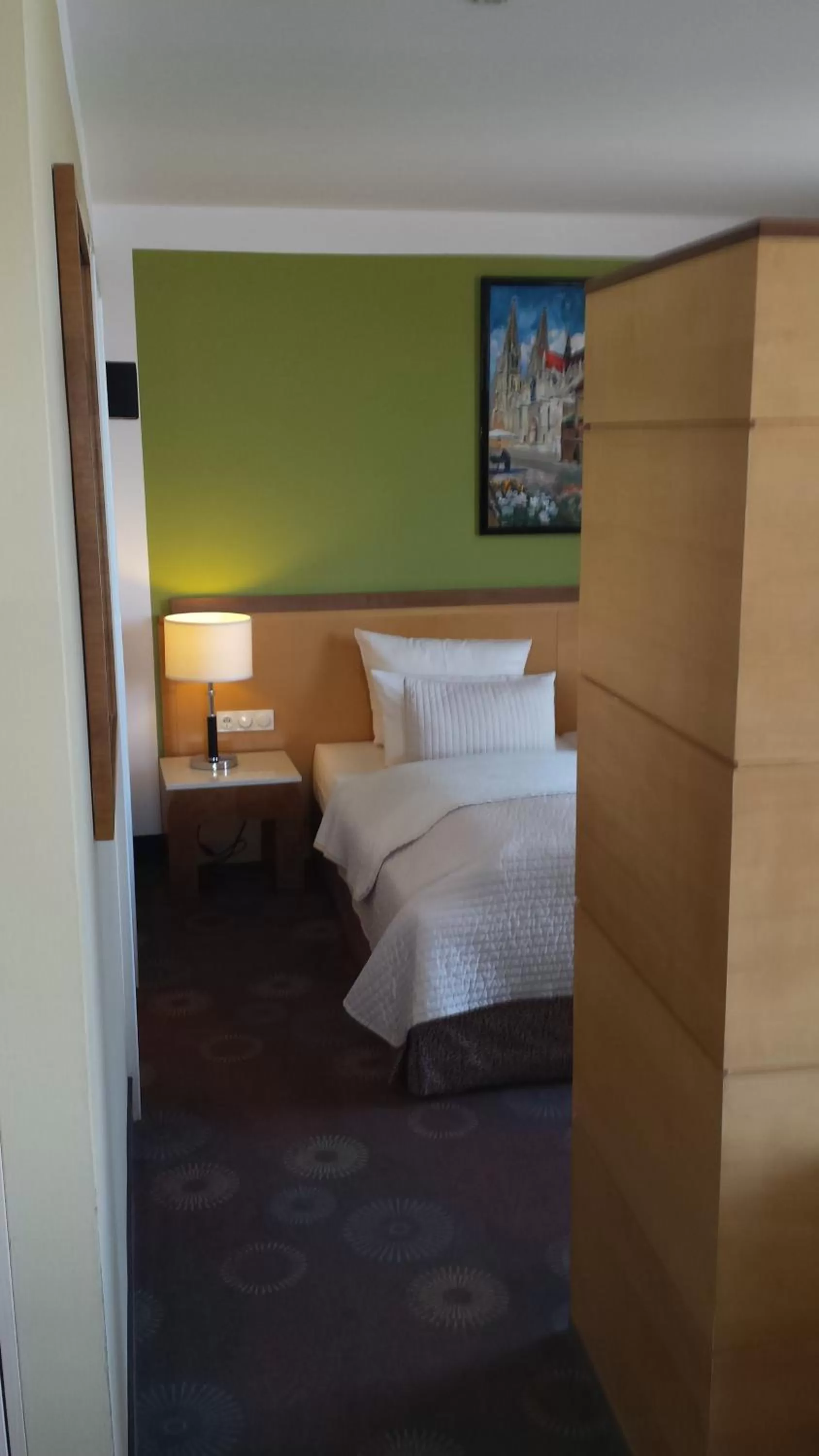 Photo of the whole room, Bed in SORAT Insel-Hotel Regensburg