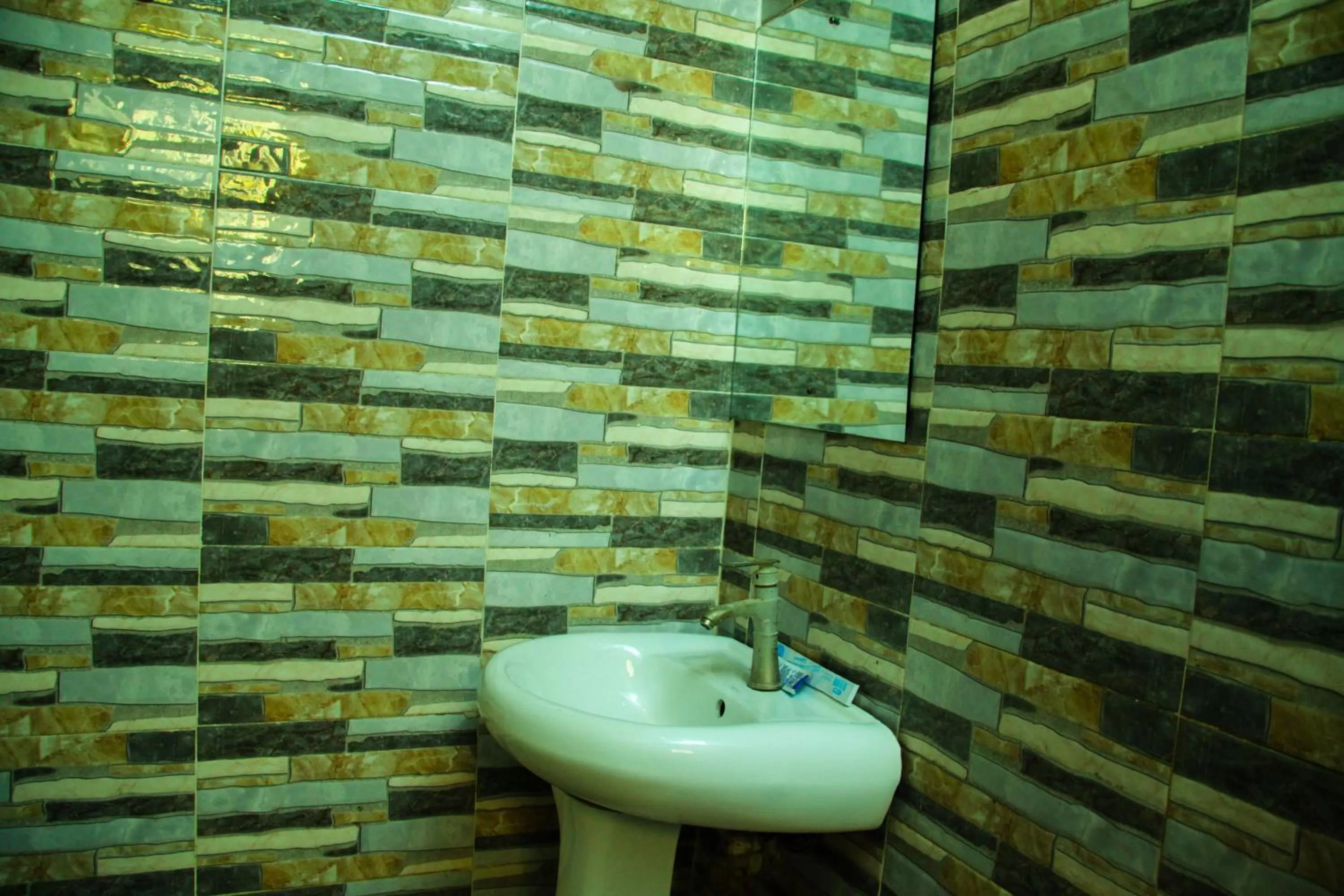 Toilet, Bathroom in ONTARIO SUITES