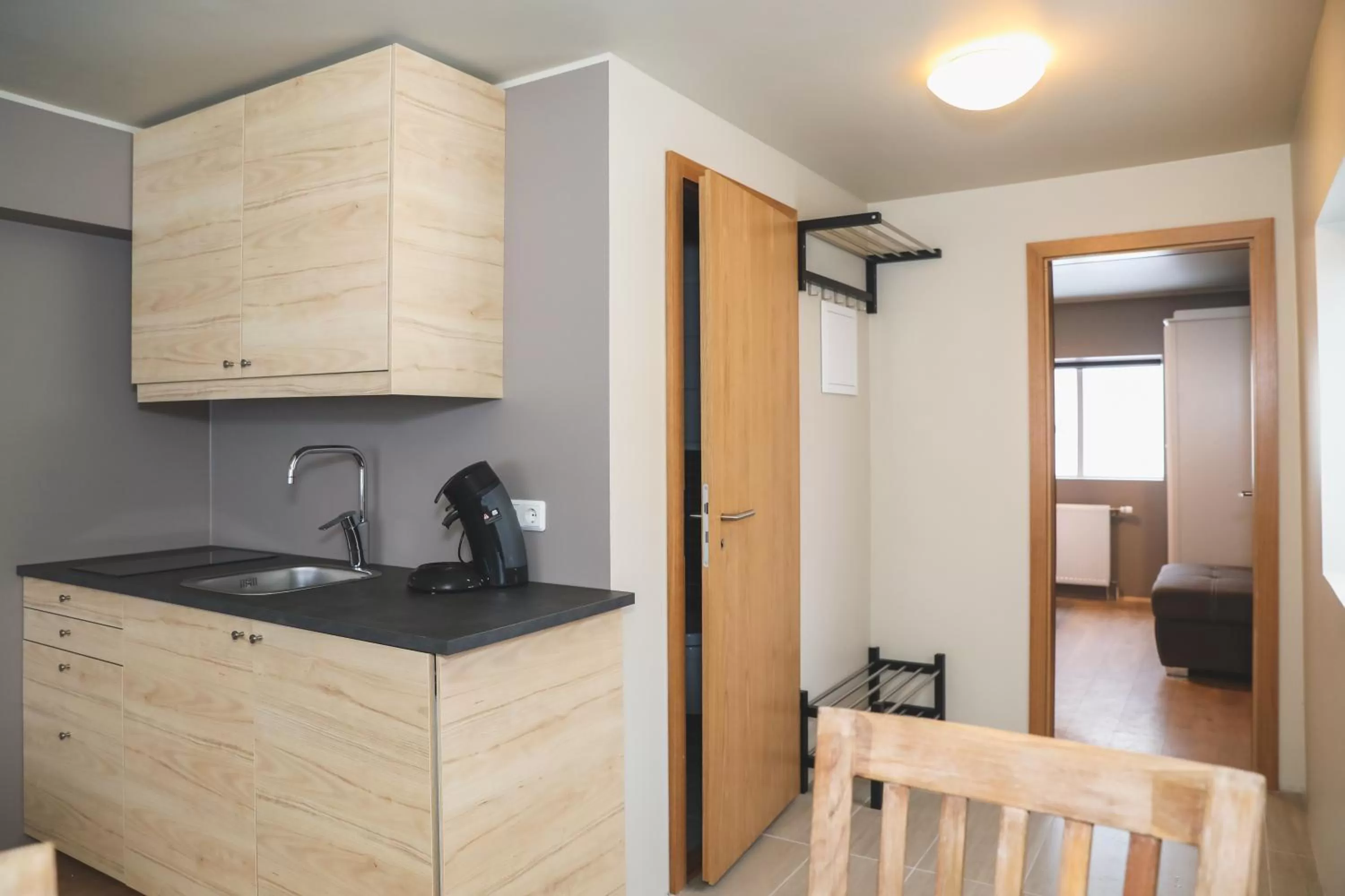 Kitchen or kitchenette in E18 Apartments