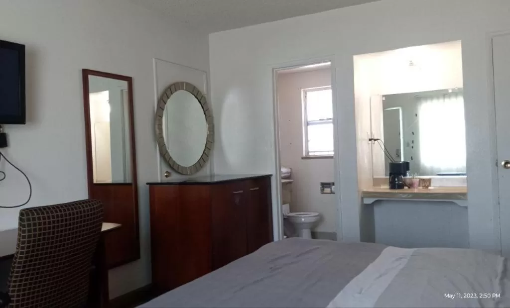 Bed in Travelers Beach Inn