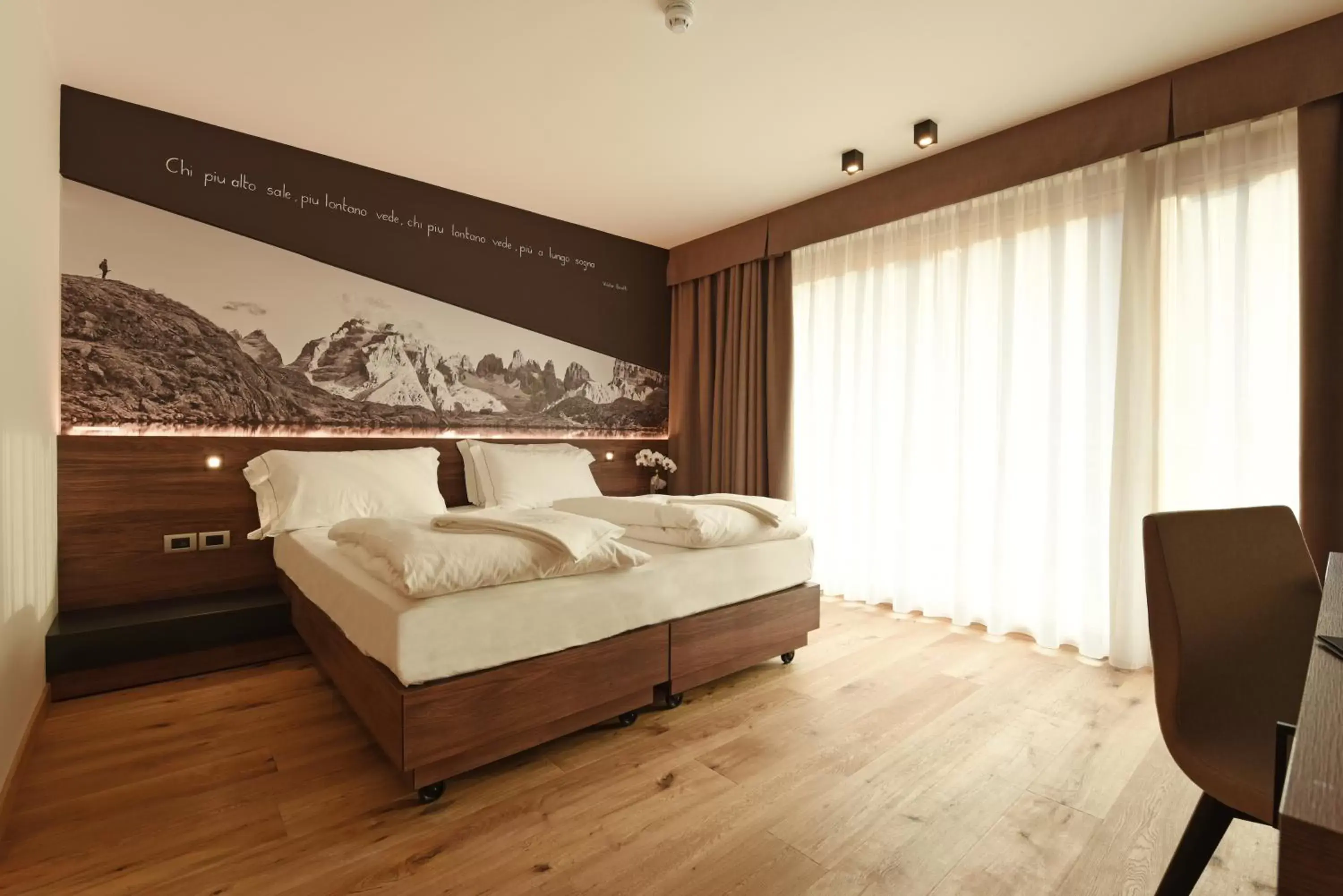 Bed in Dolomeet Boutique Hotel