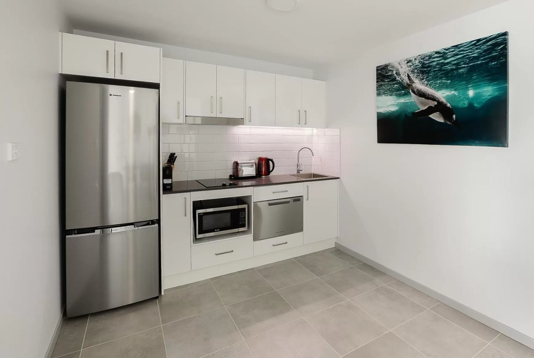 Coffee/tea facilities in East Maitland Executive Apartments