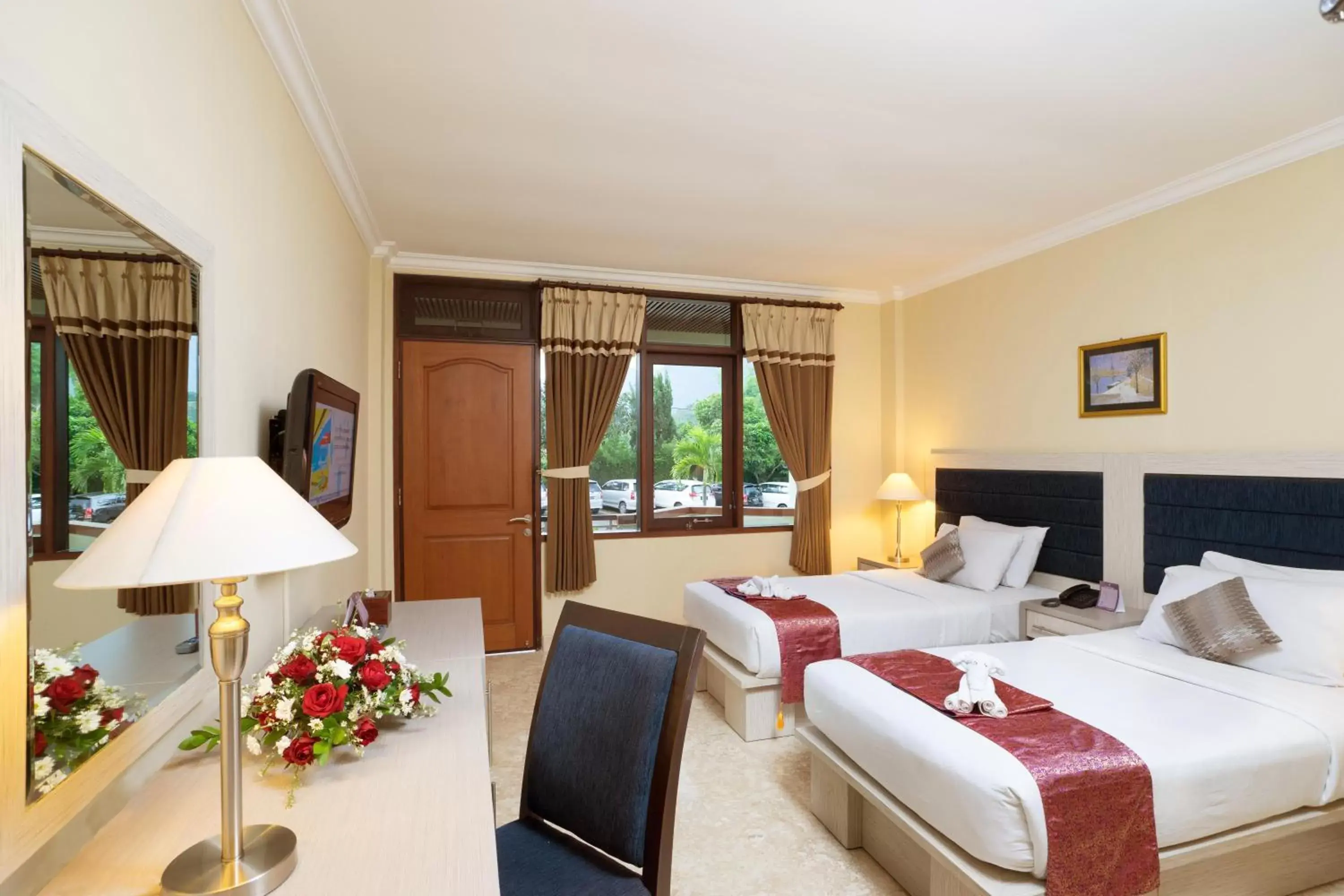Bedroom in Royal Orchids Garden Hotel & Condominium
