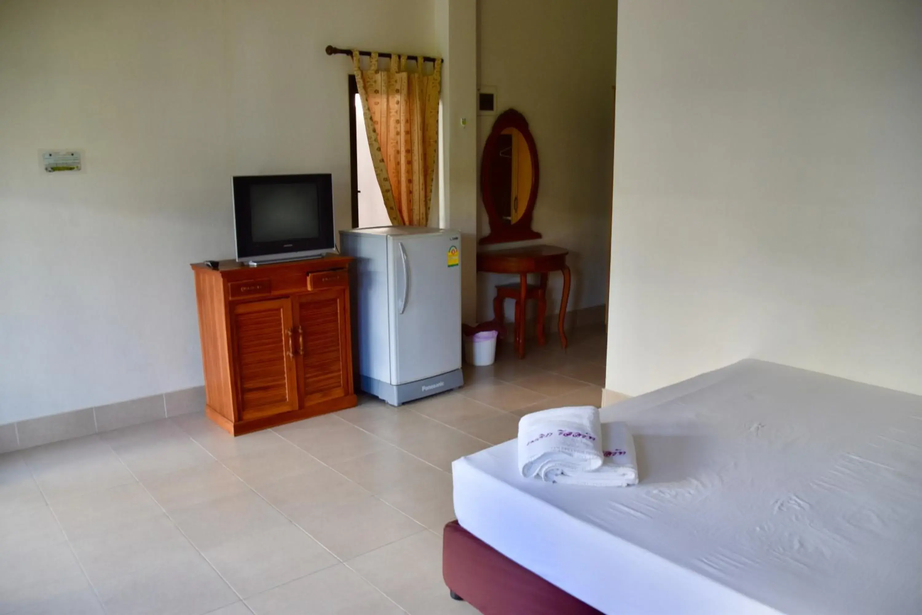 Bedroom, TV/Entertainment Center in Magic Resort