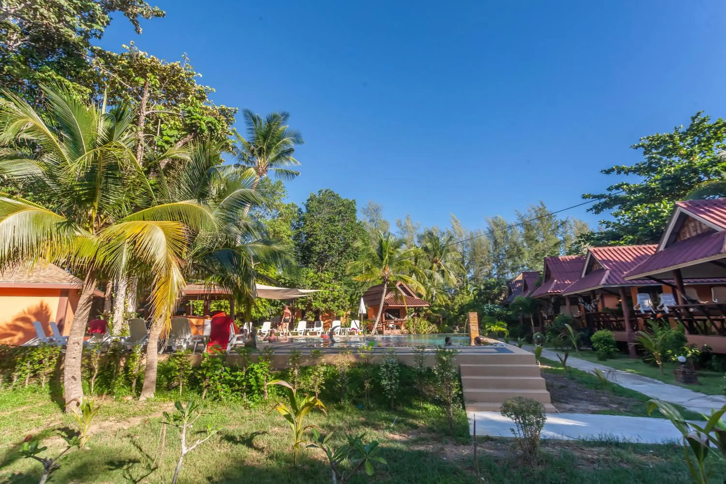 Swimming pool, Garden in Lanta Pearl Beach Resort