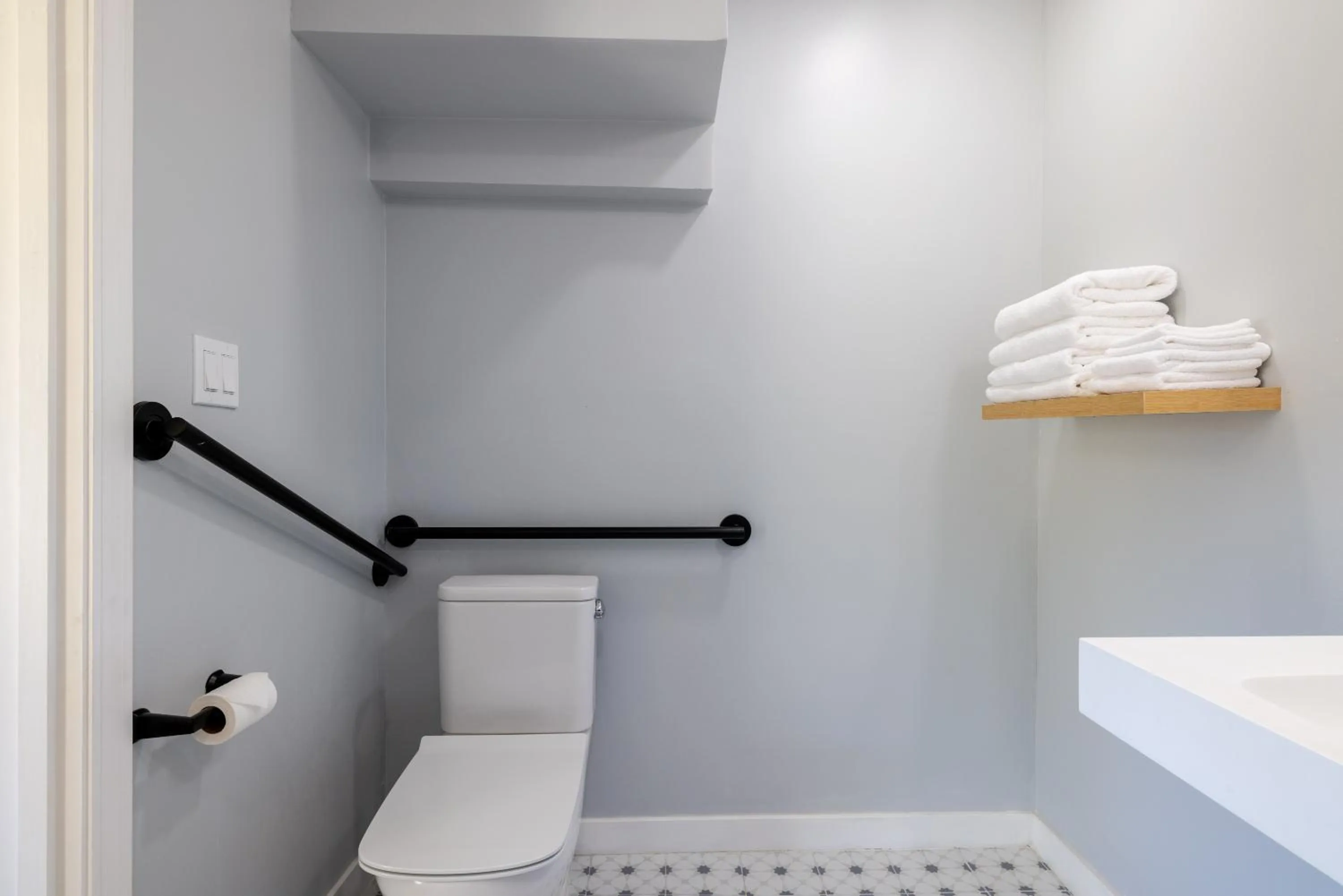 Toilet in Tides Oceanview Inn and Cottages