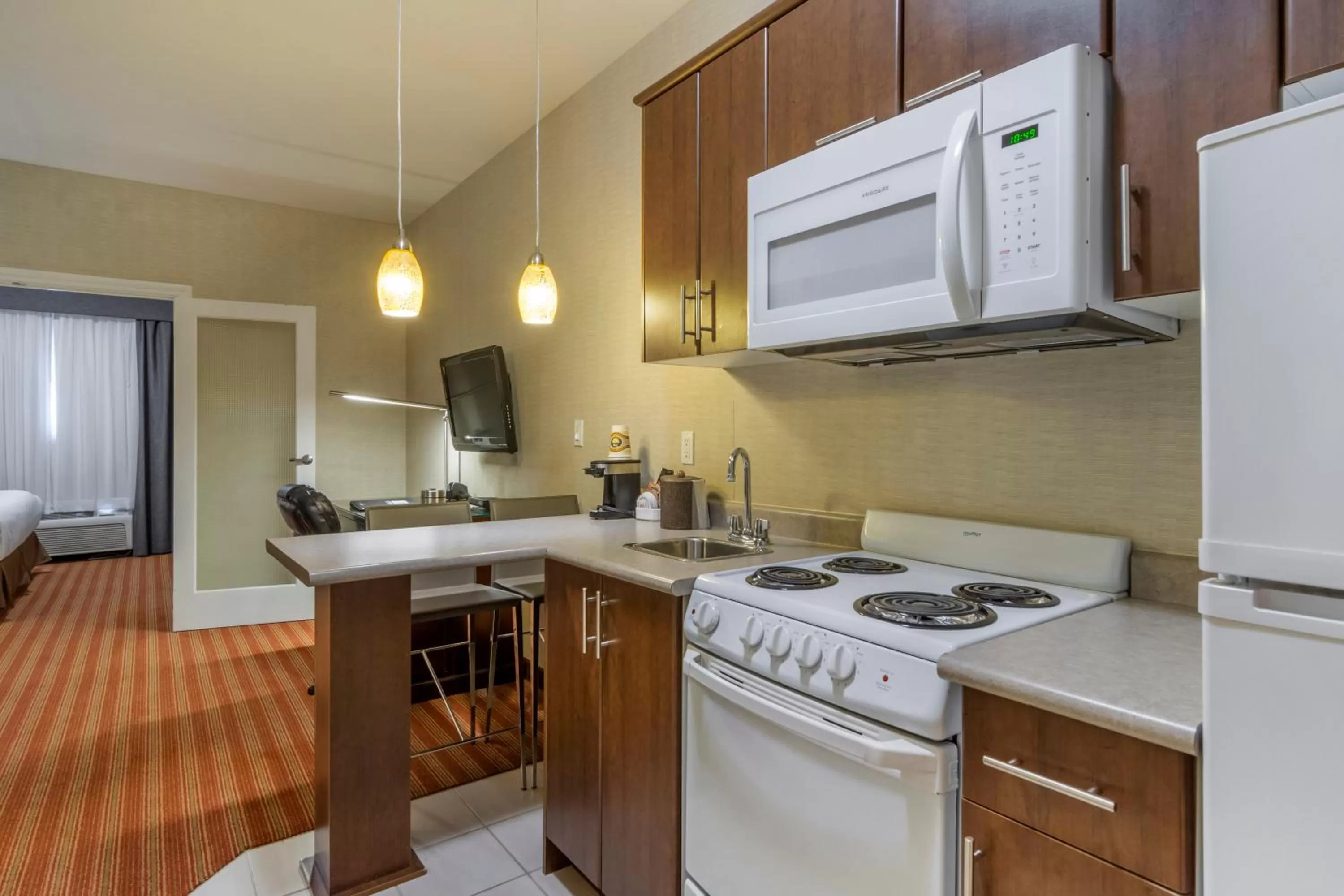 Kitchen or kitchenette in Devonian Hotel and Suites
