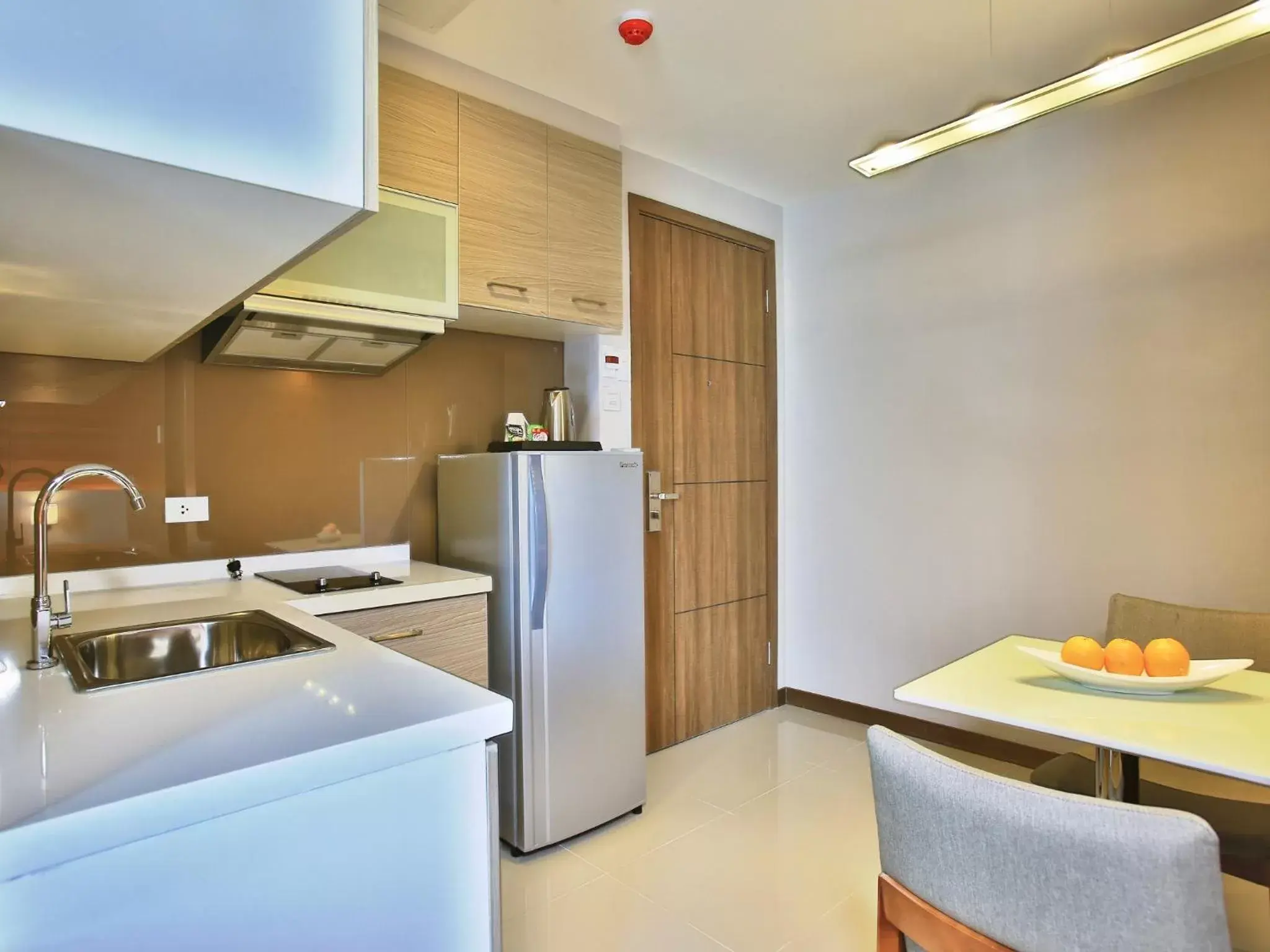 Kitchen or kitchenette, Kitchen/Kitchenette in Valero Grand Suites by Swiss-Belhotel