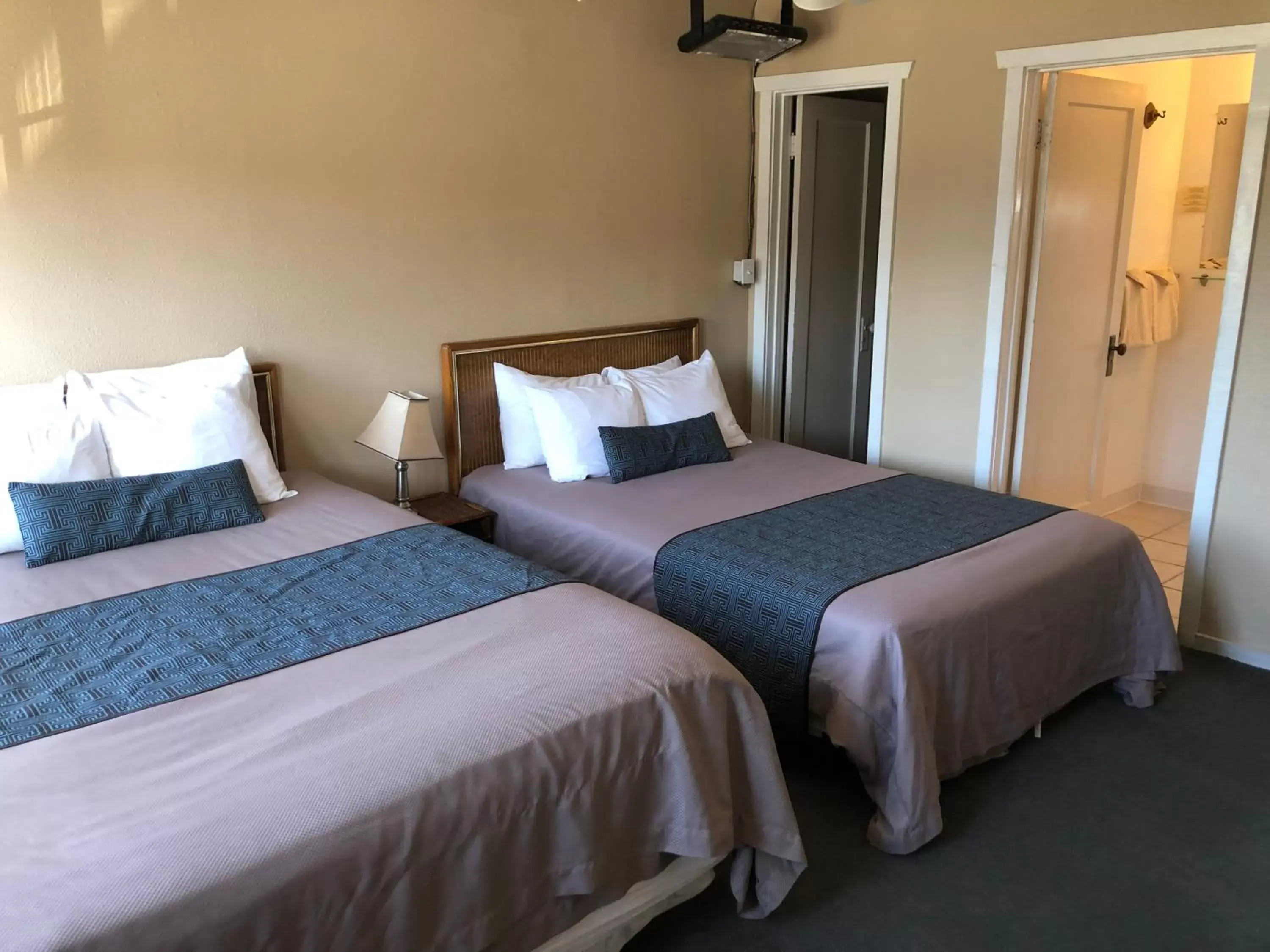 Bed in Panamint Springs Motel & Tents