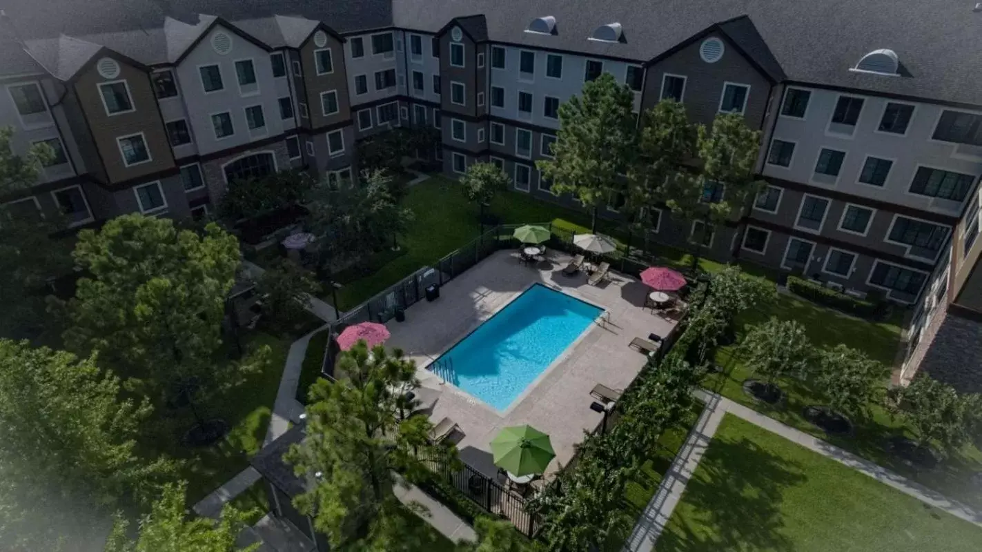 Swimming pool, Pool View in Staybridge Suites Houston West - Energy Corridor, an IHG Hotel