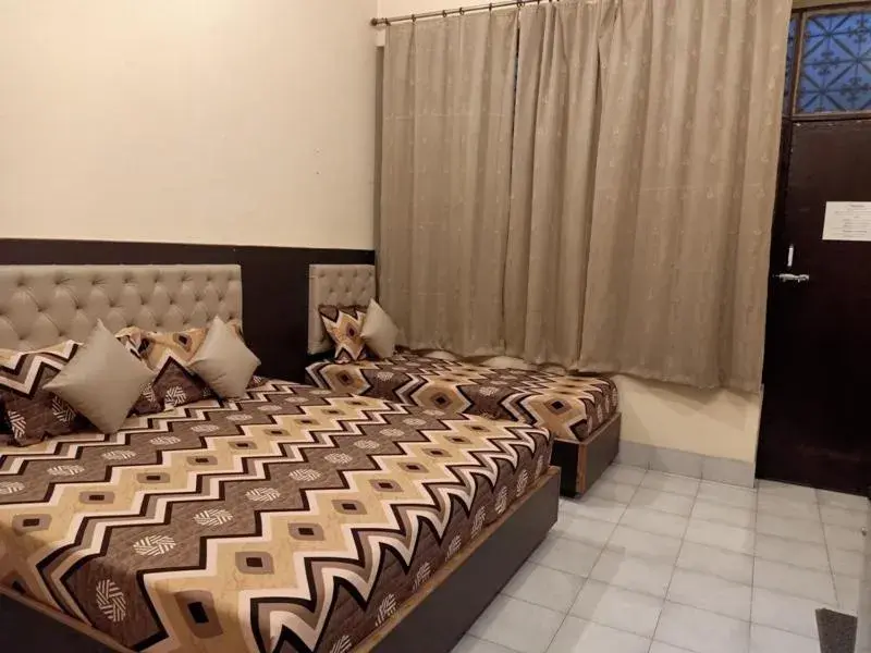 Photo of the whole room, Bed in Scindhia Guest House Photo of the whole room, Bed in Scindhia Guest House