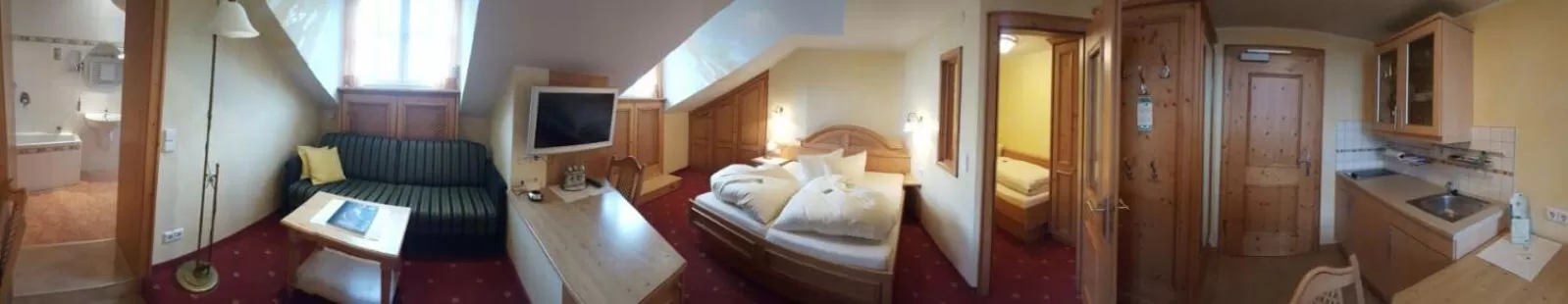 Photo of the whole room, Bed in Landhotel Grüner Baum