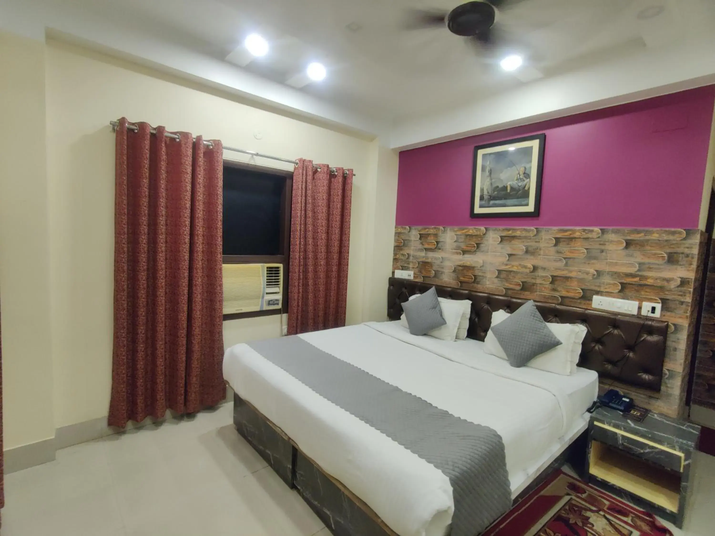 air conditioner, Bed in Hotel Swastik Regency