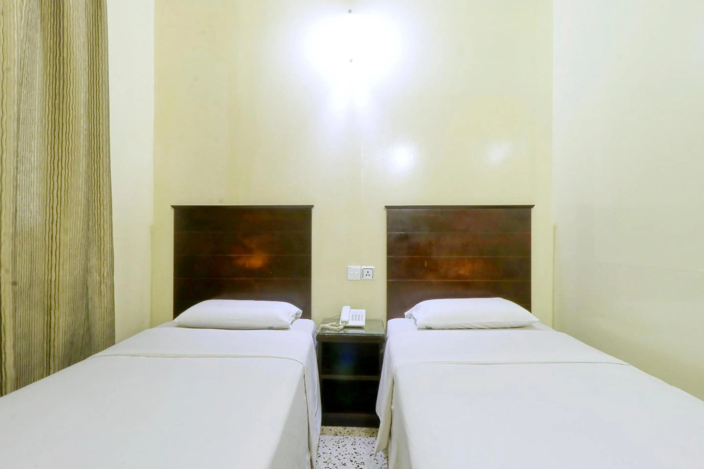 Bed in Nan Yeang Hotel Petaling Street