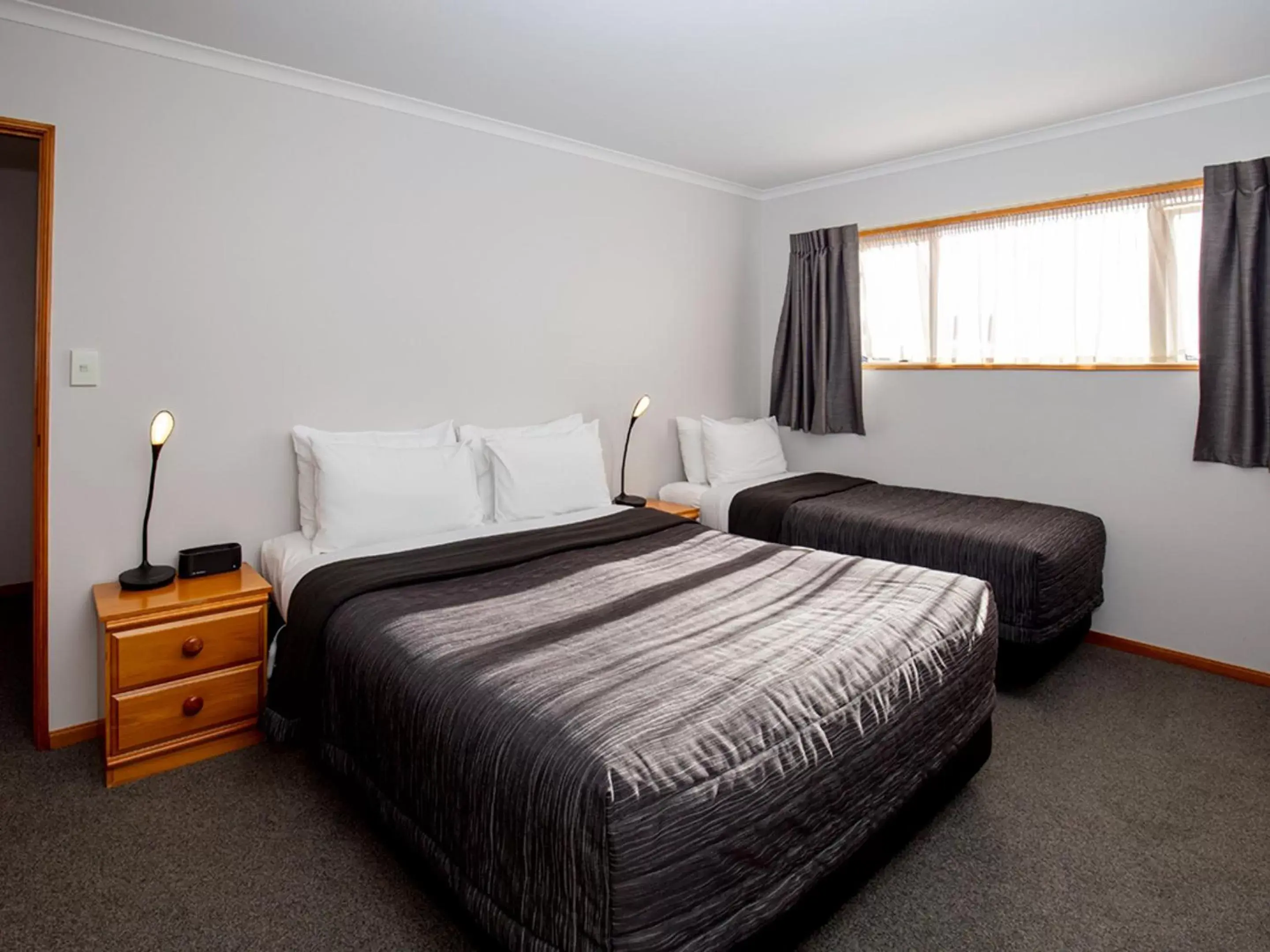 Bedroom, Bed in ASURE Chelsea Gateway Motor Lodge