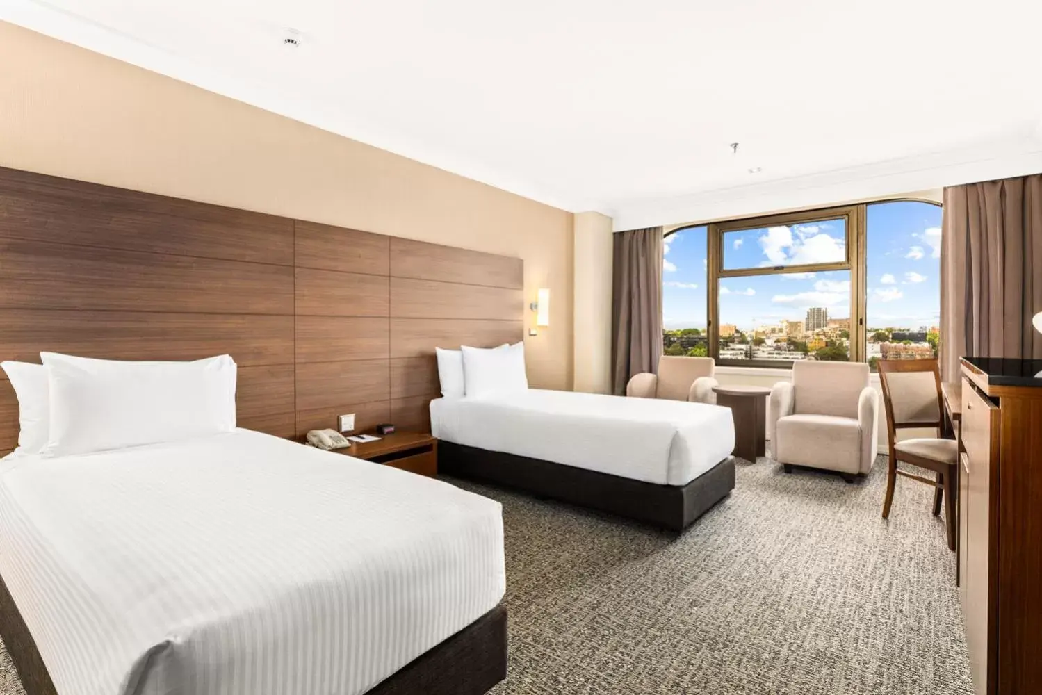 Bed in The Sydney Boulevard Hotel