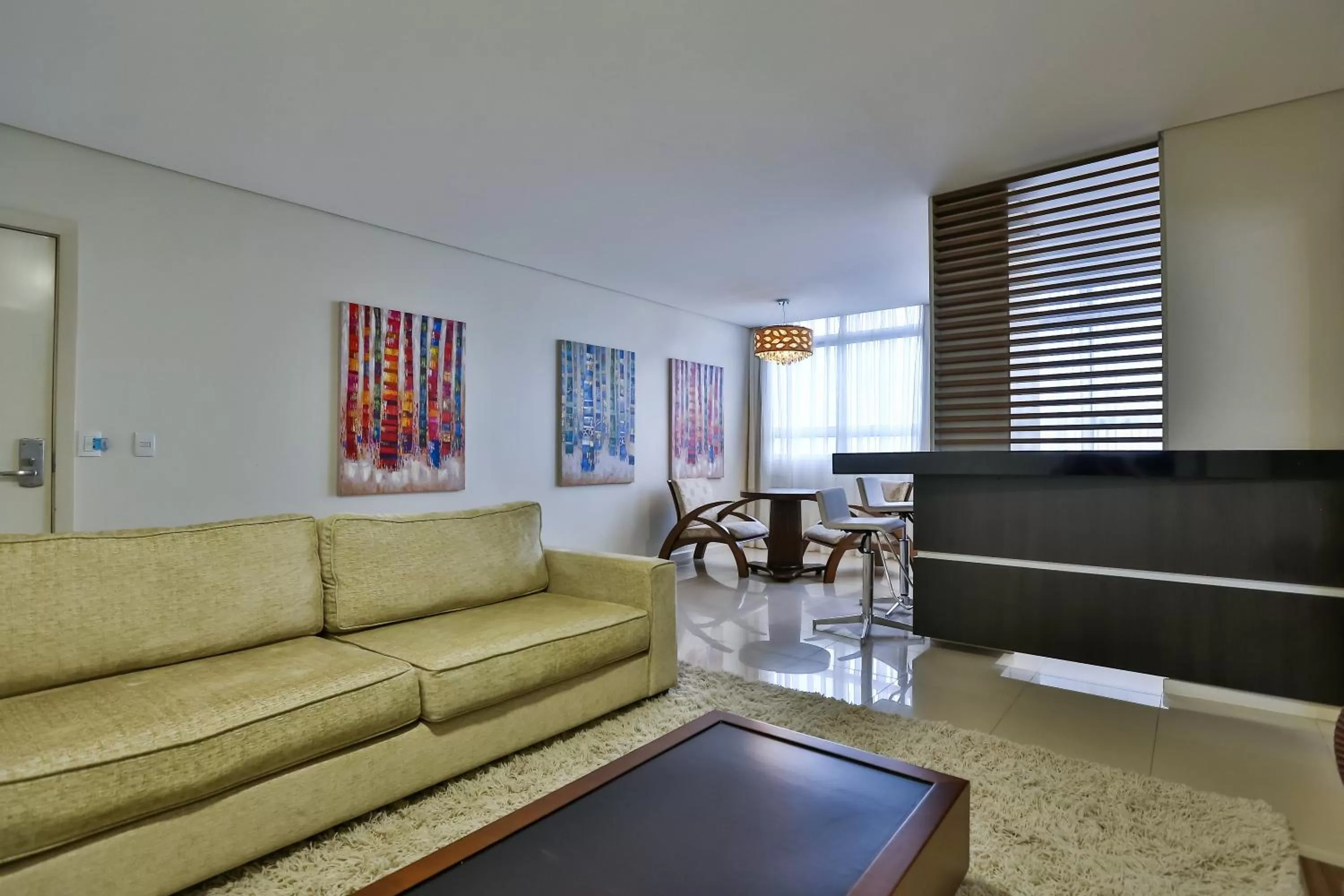 Living room in Wyndham Golden Foz Suítes