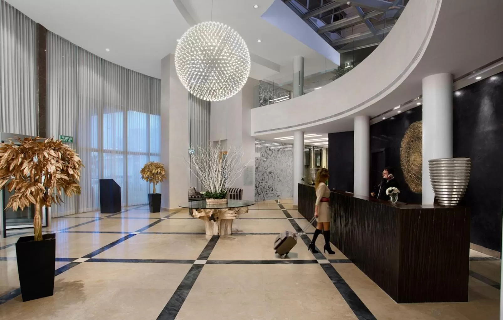 Lobby or reception in Ramada Hotel & Suites by Wyndham Netanya