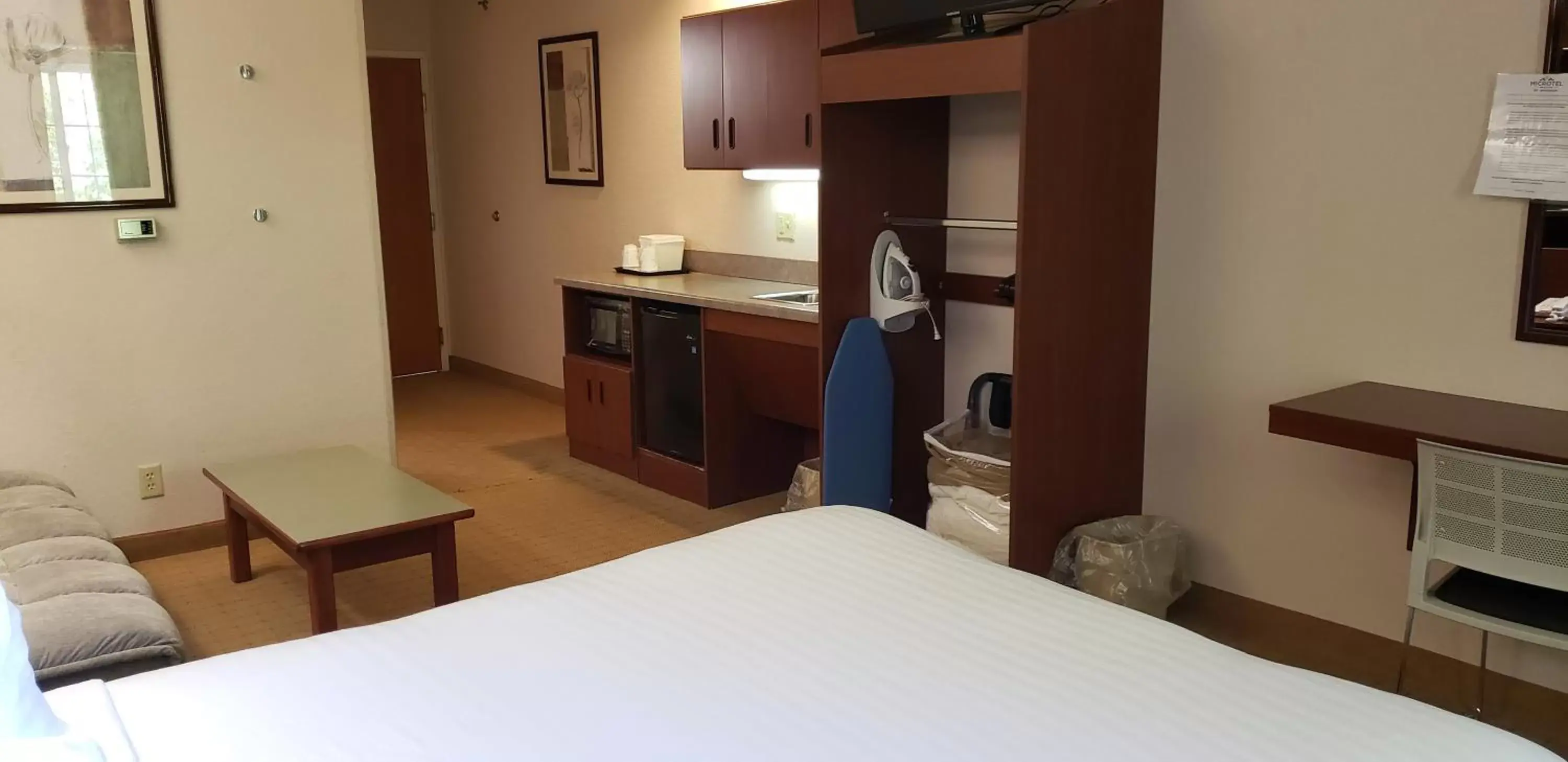 Bed in Microtel Inn & Suites by Wyndham Wellsville