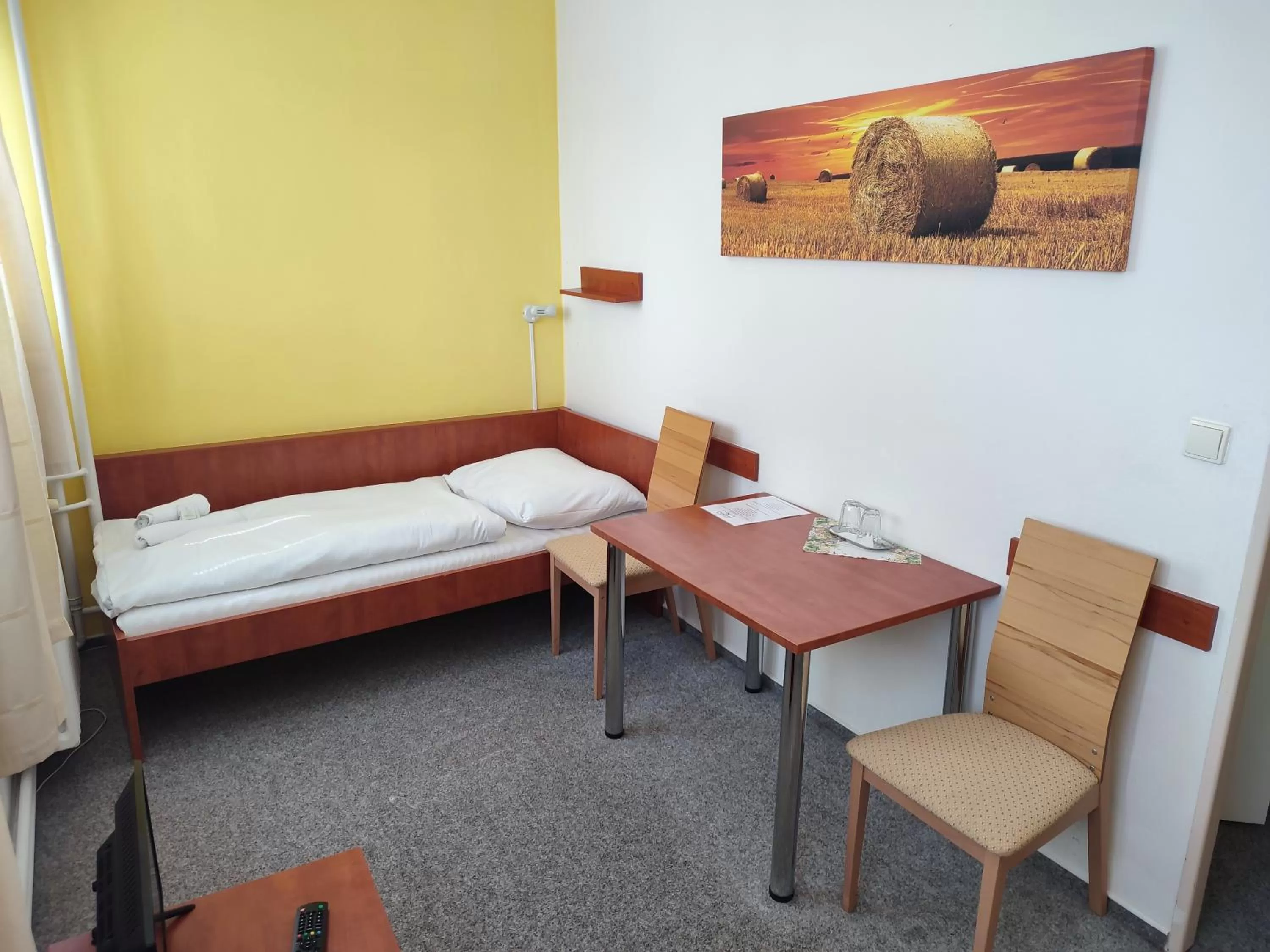 Bed in BEST Hotel Garni
