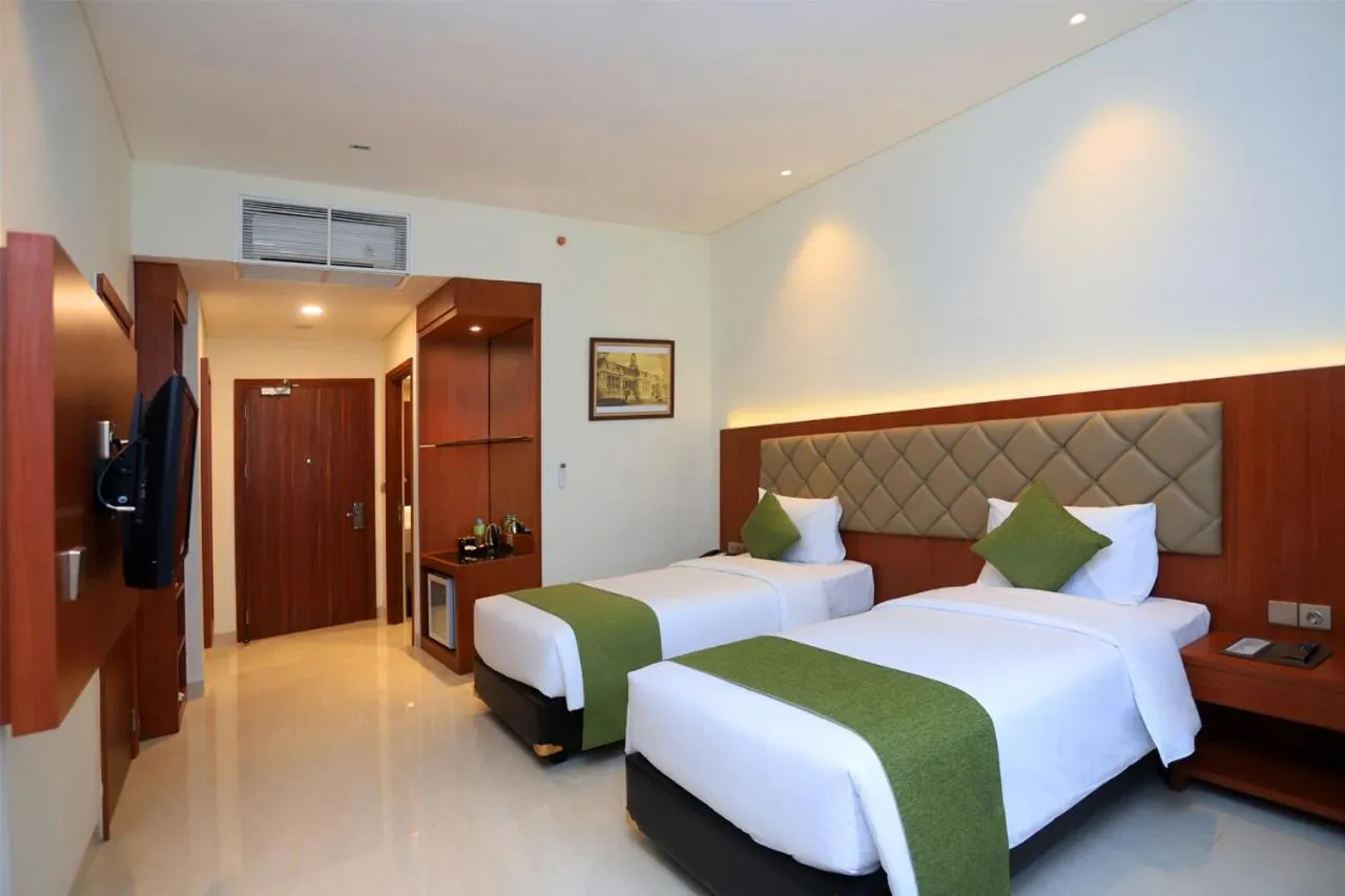Bed in Luxury Inn Arion Hotel