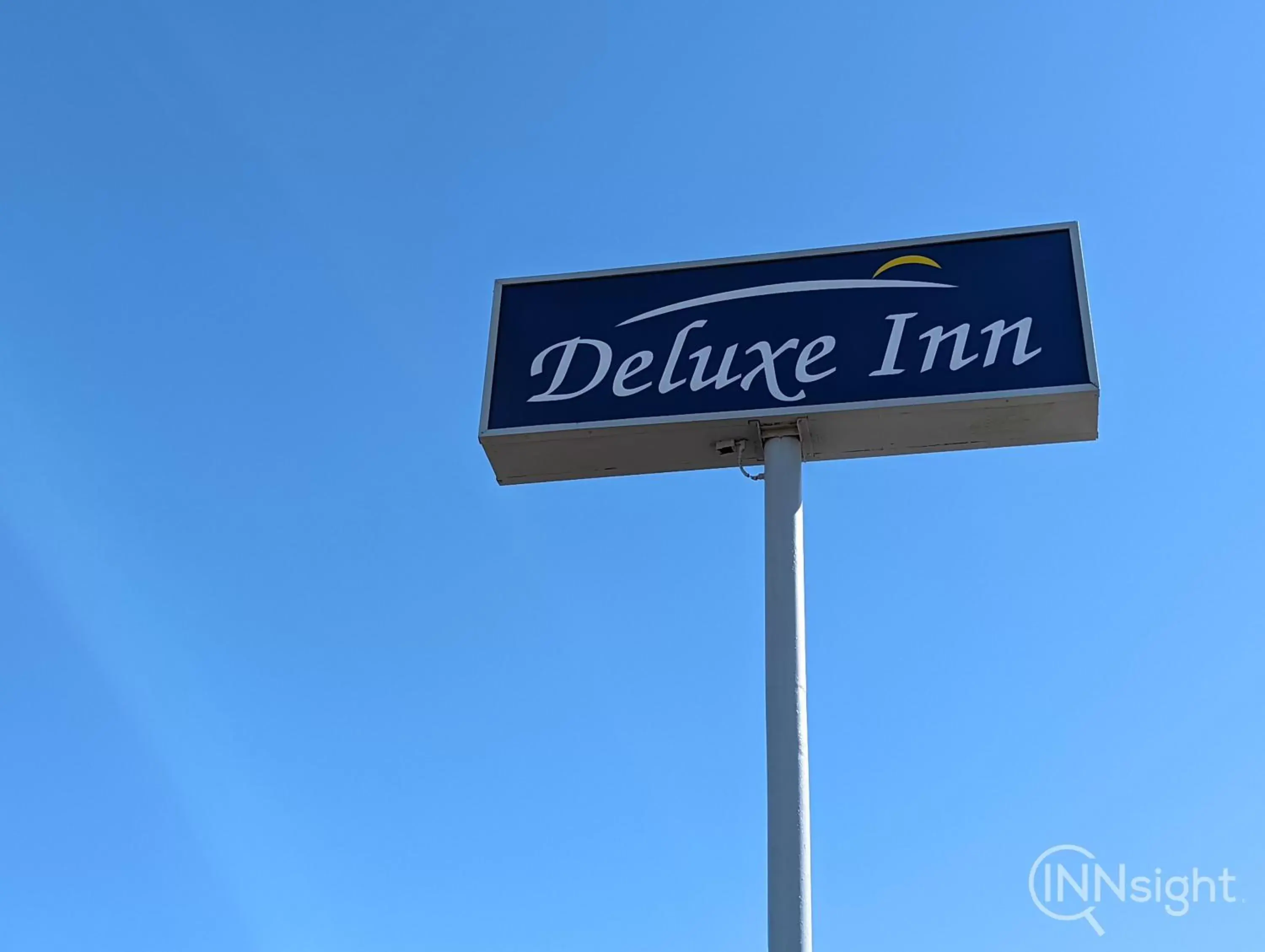 Property logo or sign in Deluxe Inn