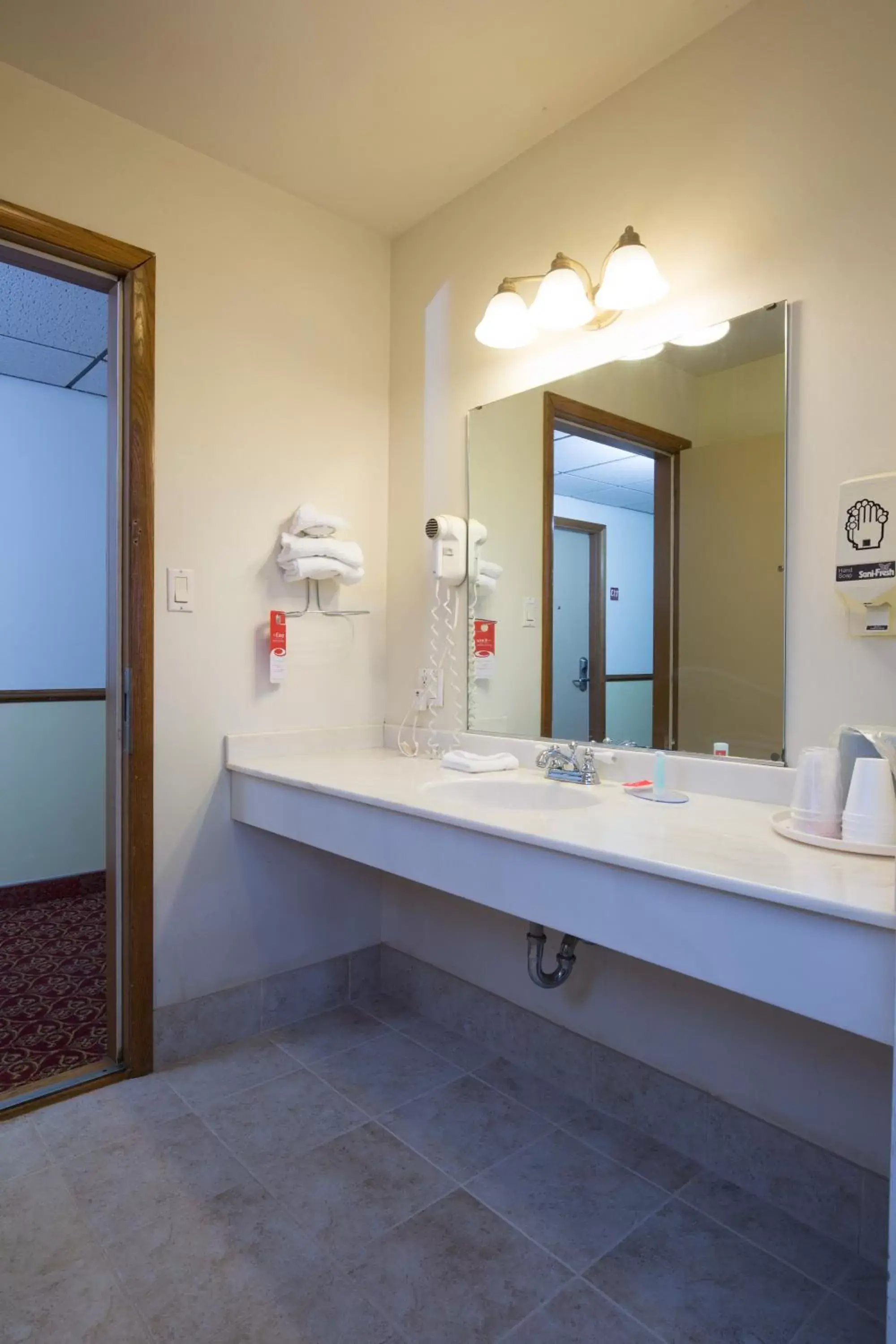 Bathroom in Travelodge by Wyndham Merrill