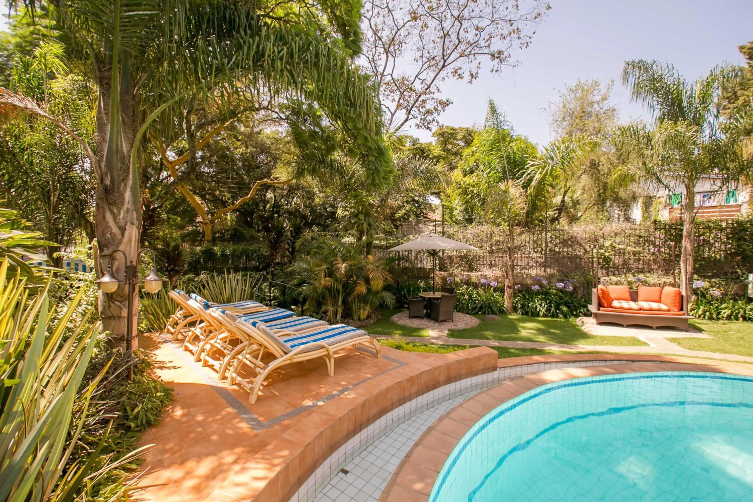 Swimming pool in Waridi Paradise Hotel and Suites