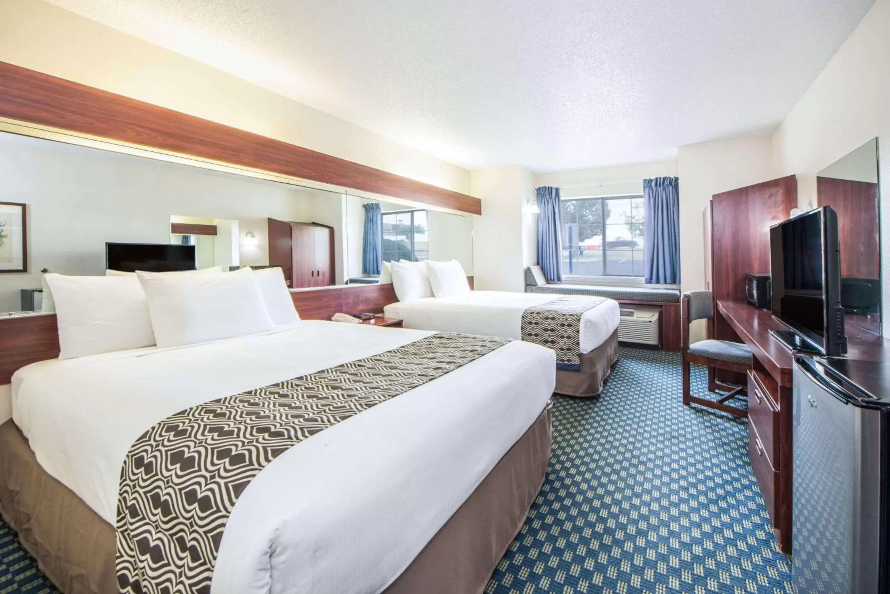 Photo of the whole room in Microtel Inn & Suites by Wyndham Tulsa - Catoosa Route 66